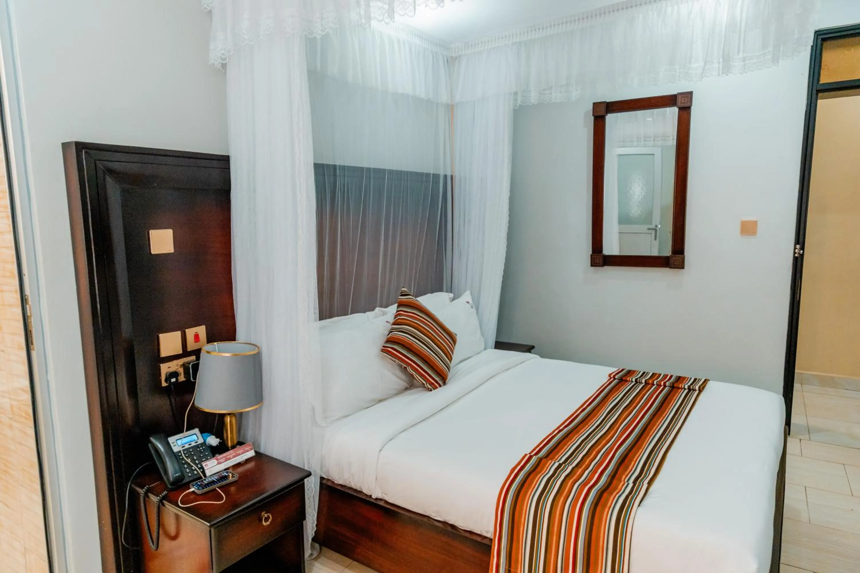Bed in Las Vegas Garden Hotel Mbarara