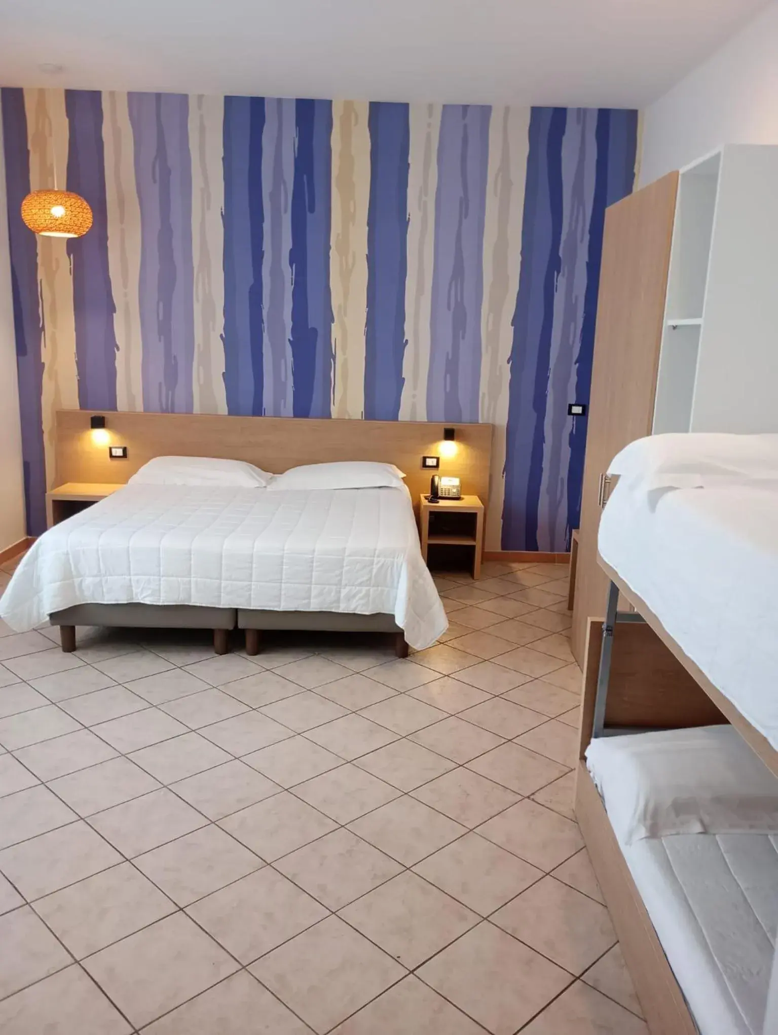 Quadruple Room in Hotel La Martinica Quadruple Room in Hotel La Martinica