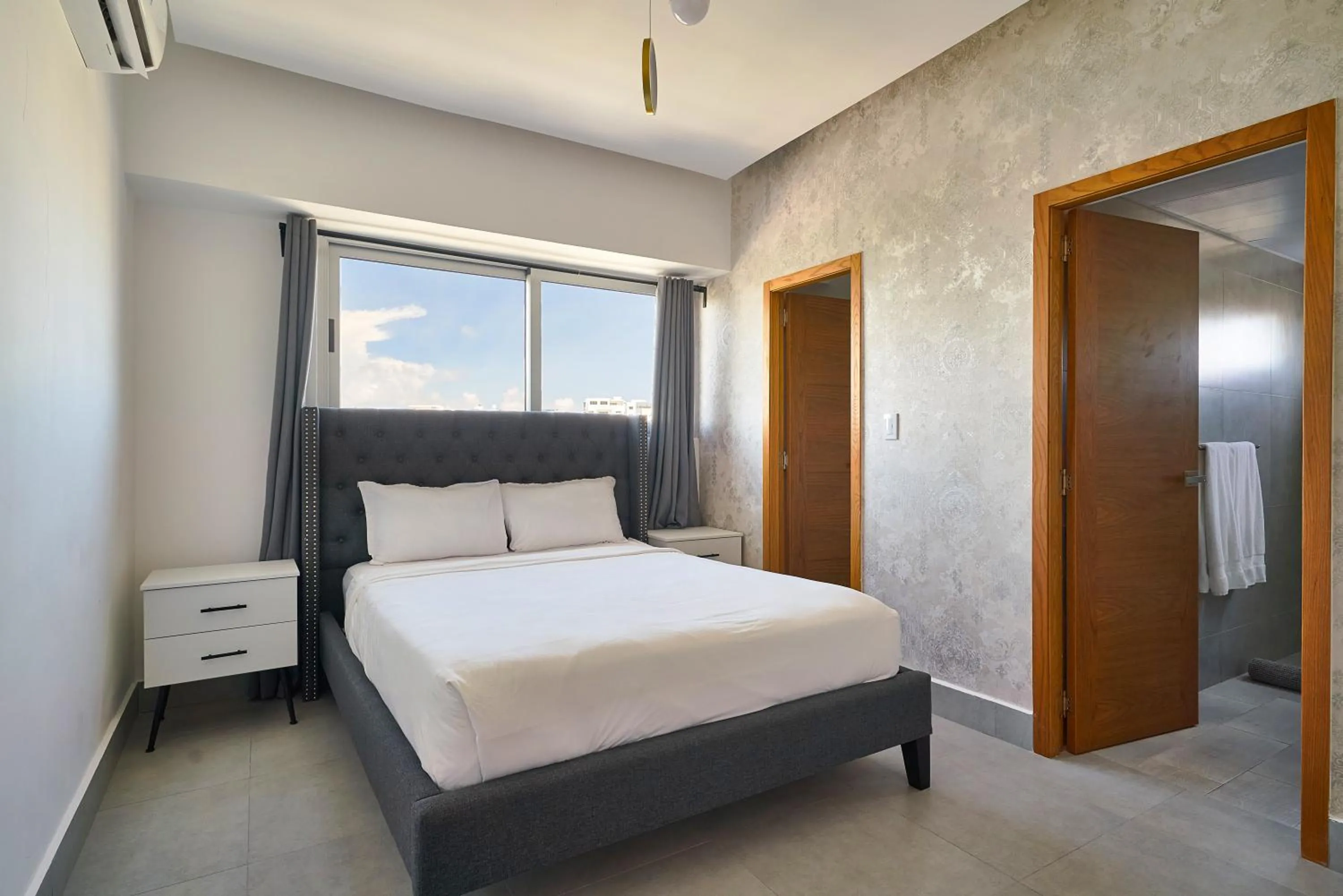 Bed in Central Suites Tower