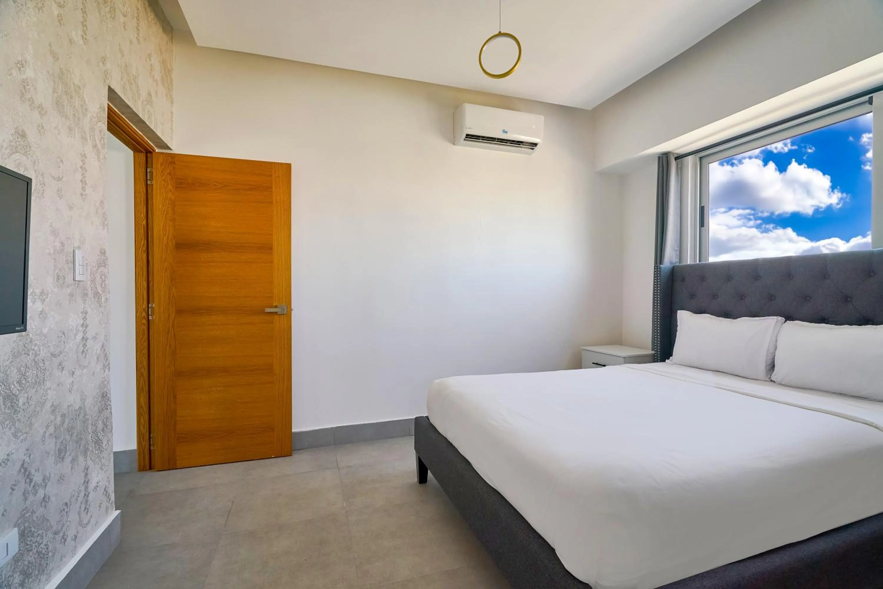 Bed in Central Suites Tower