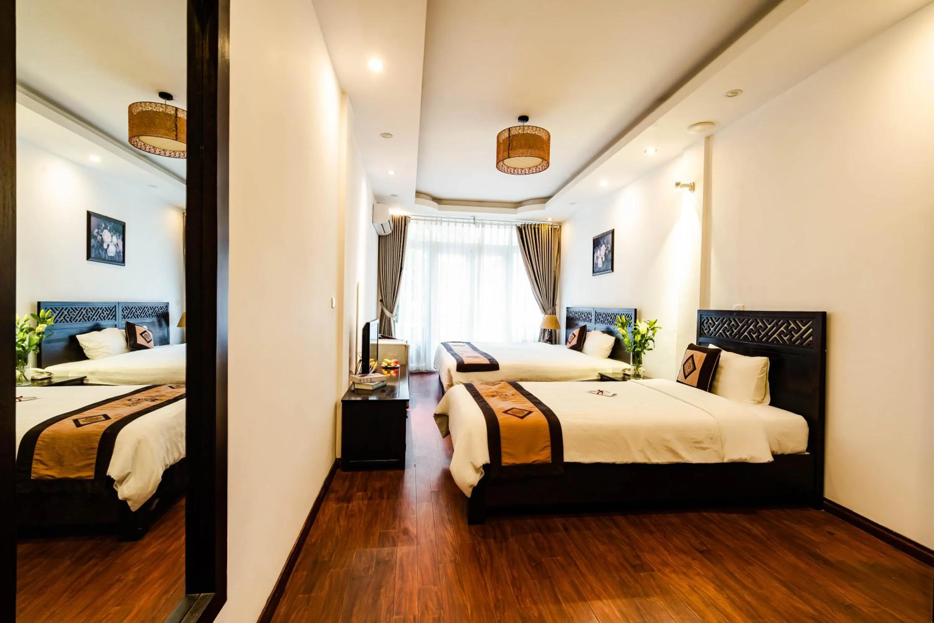 Bed in Wild Lotus Hotel & Travel 2