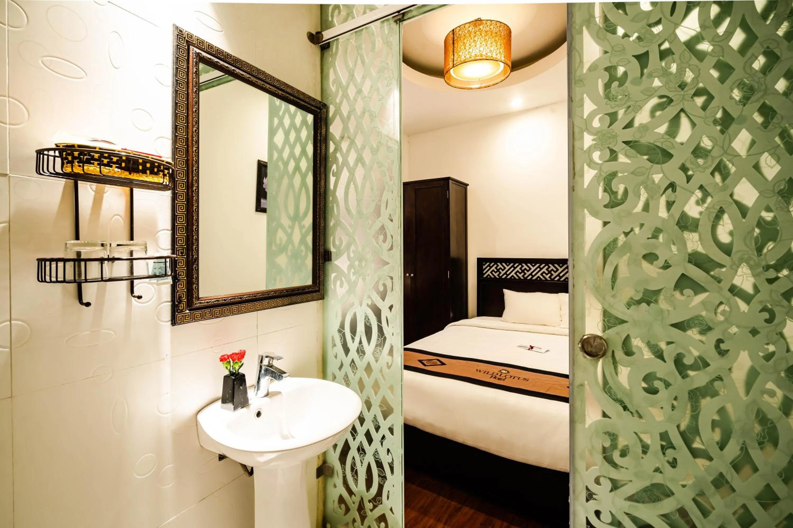 Bed in Wild Lotus Hotel & Travel 2