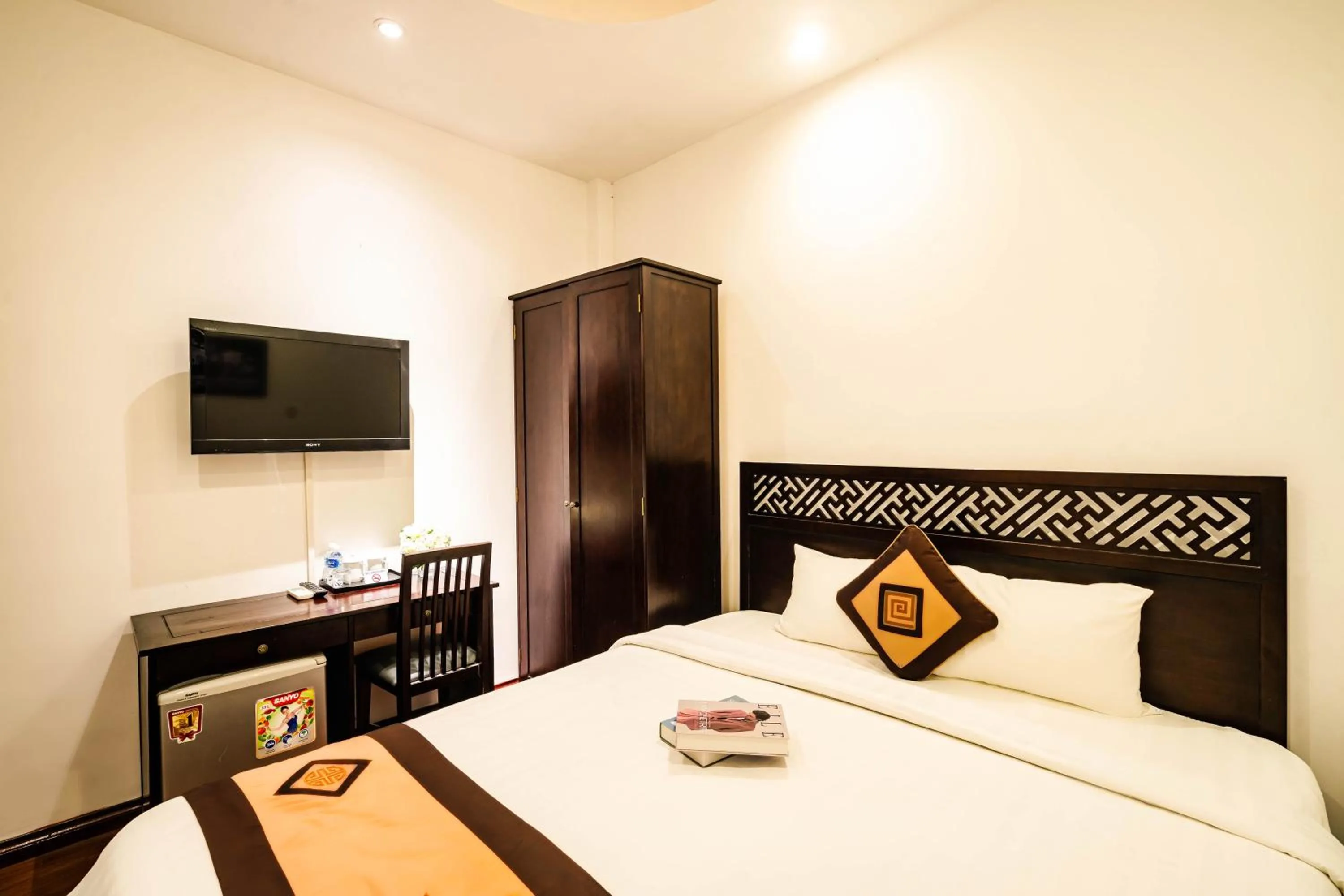 Bed in Wild Lotus Hotel & Travel 2