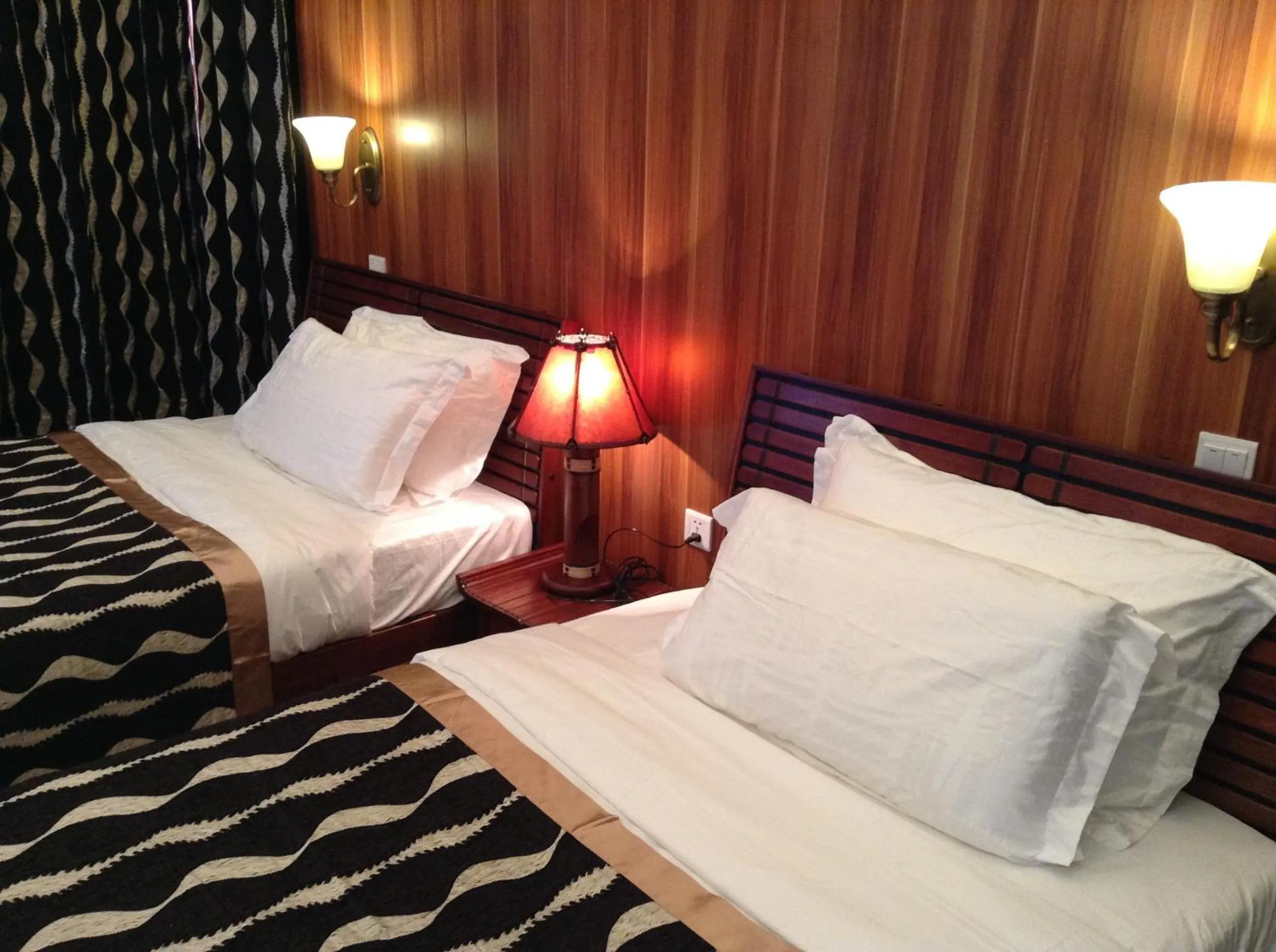 Living room, Bed in AA Lodge Maasai Mara