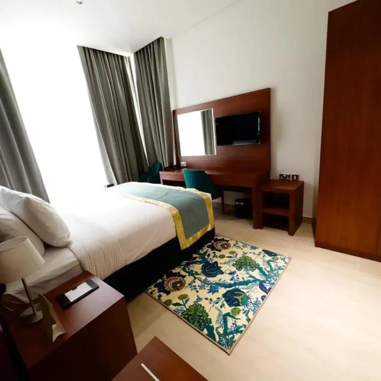 Toilet, Bed in BANIYAS PLAZA HOTEL APARTMENTS