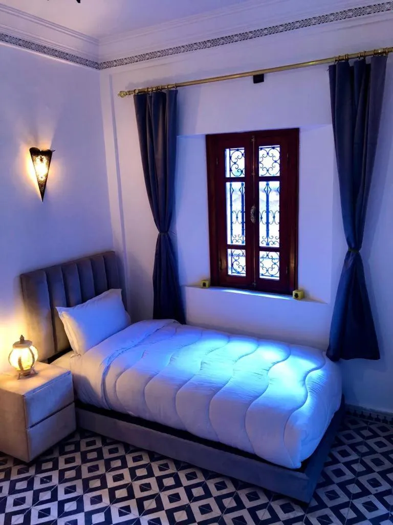 Bed in Riad Amely