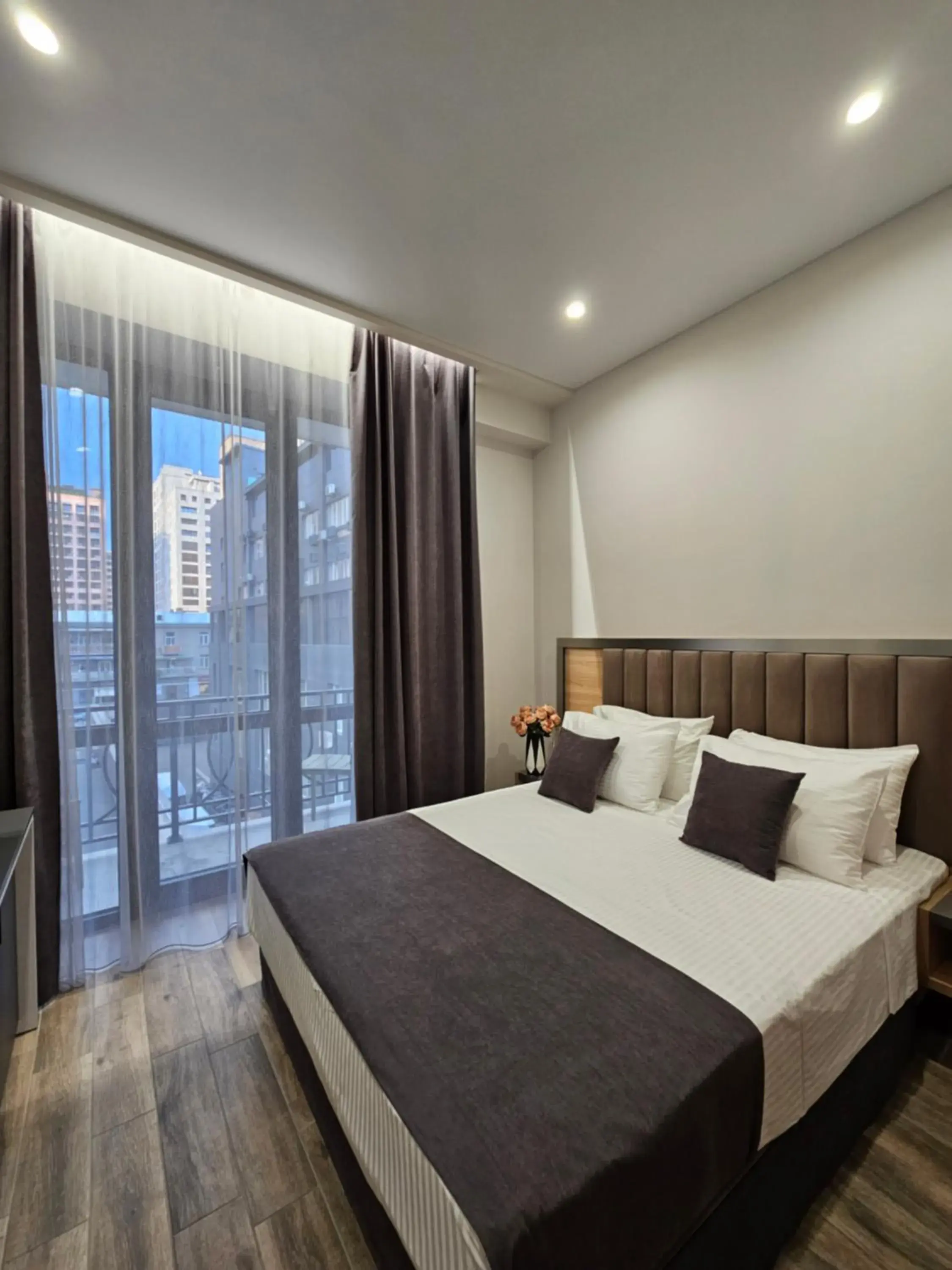 Bed in Orion ApartHotel Bed in Orion ApartHotel