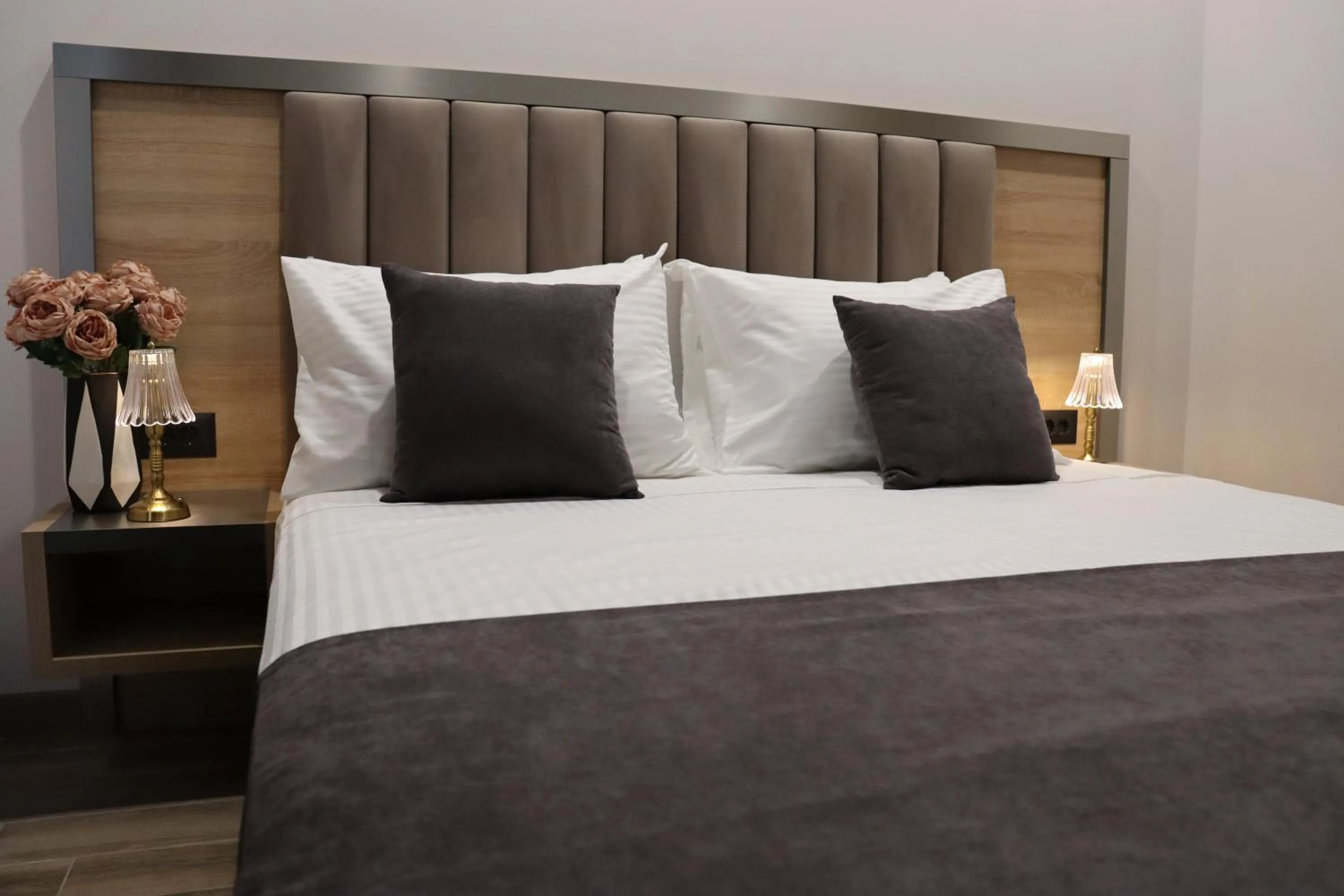 Bed in Orion ApartHotel