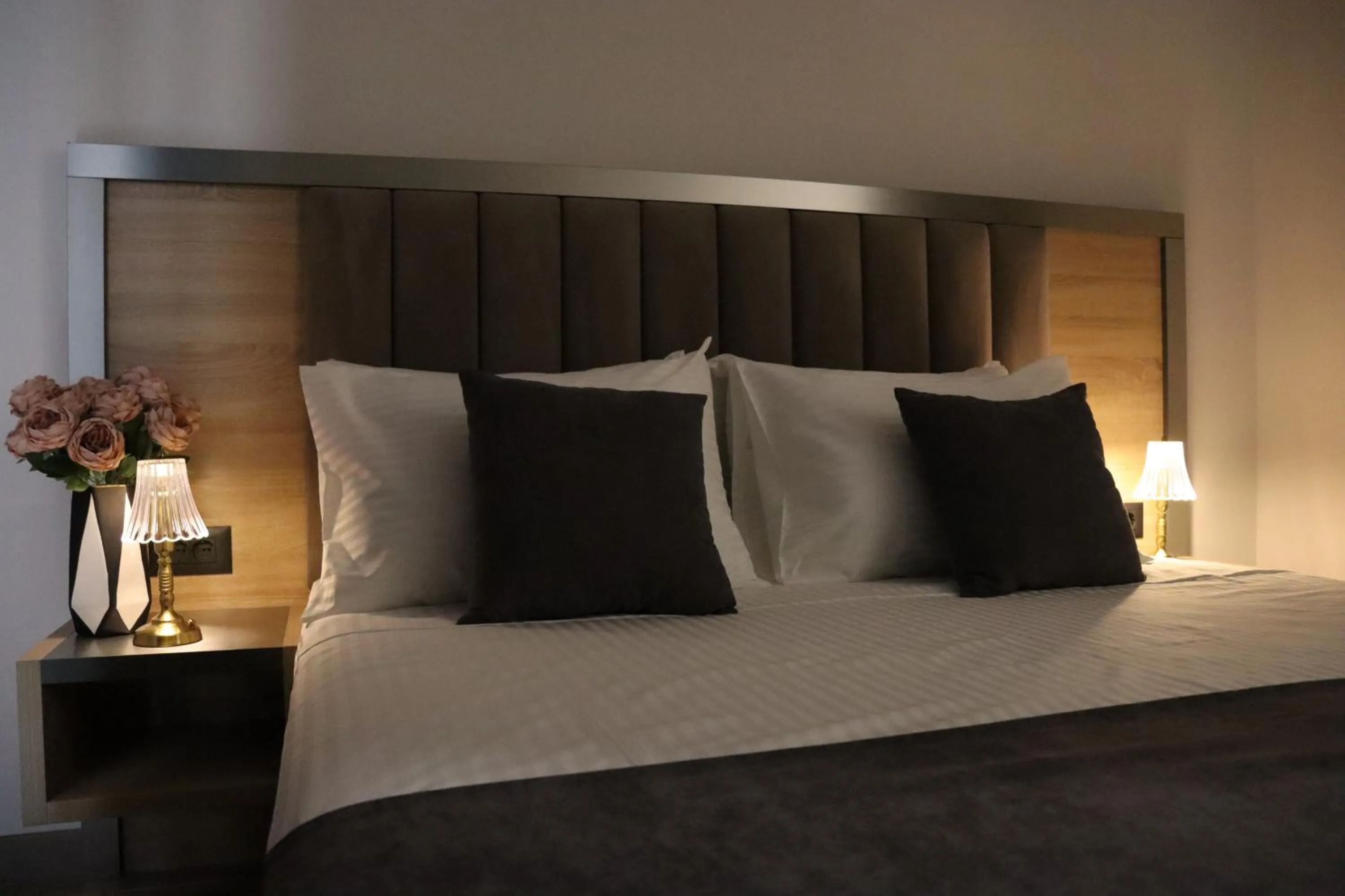 Bed in Orion ApartHotel