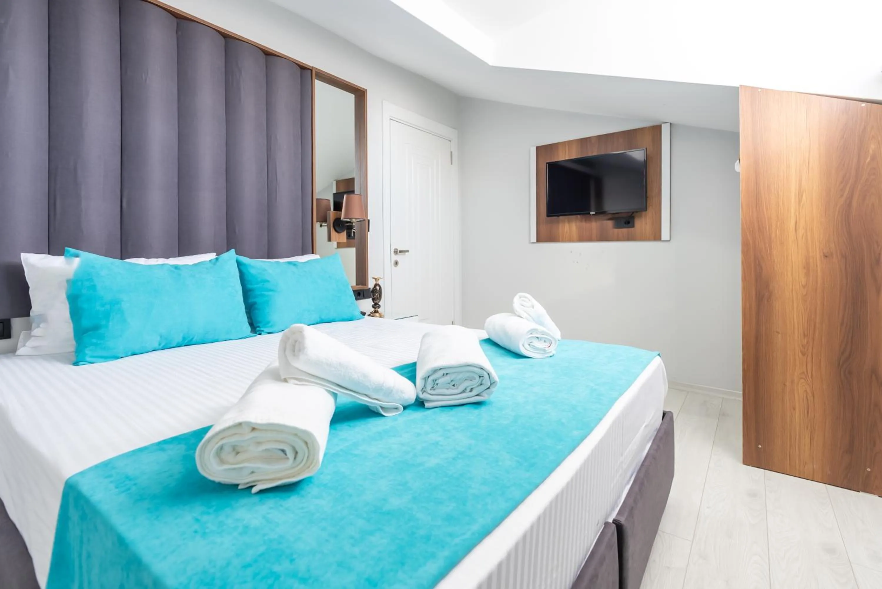 Bed in WP White Palace Hotel