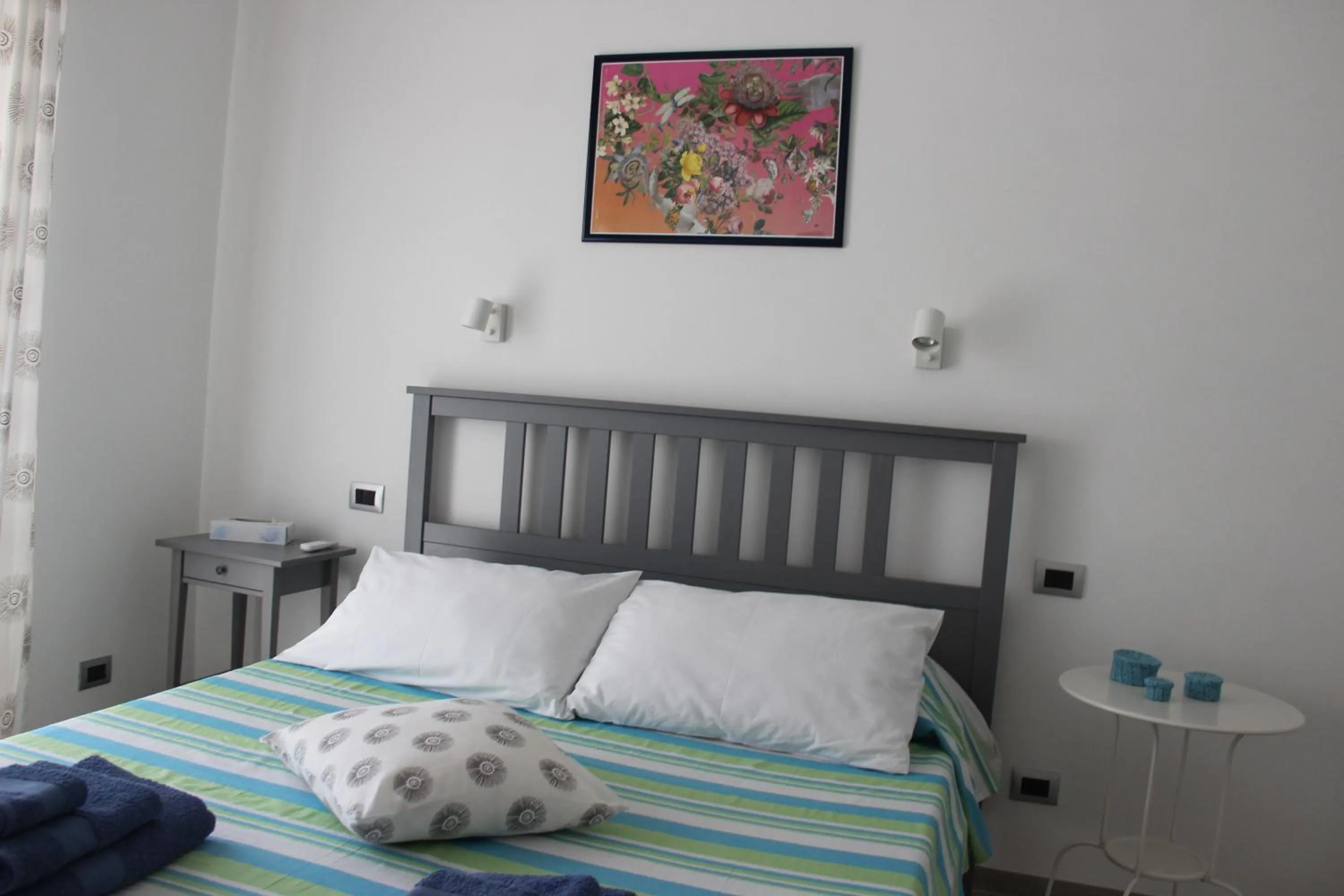 Bedroom, Bed in Appartamento Lungomare Toscanelli