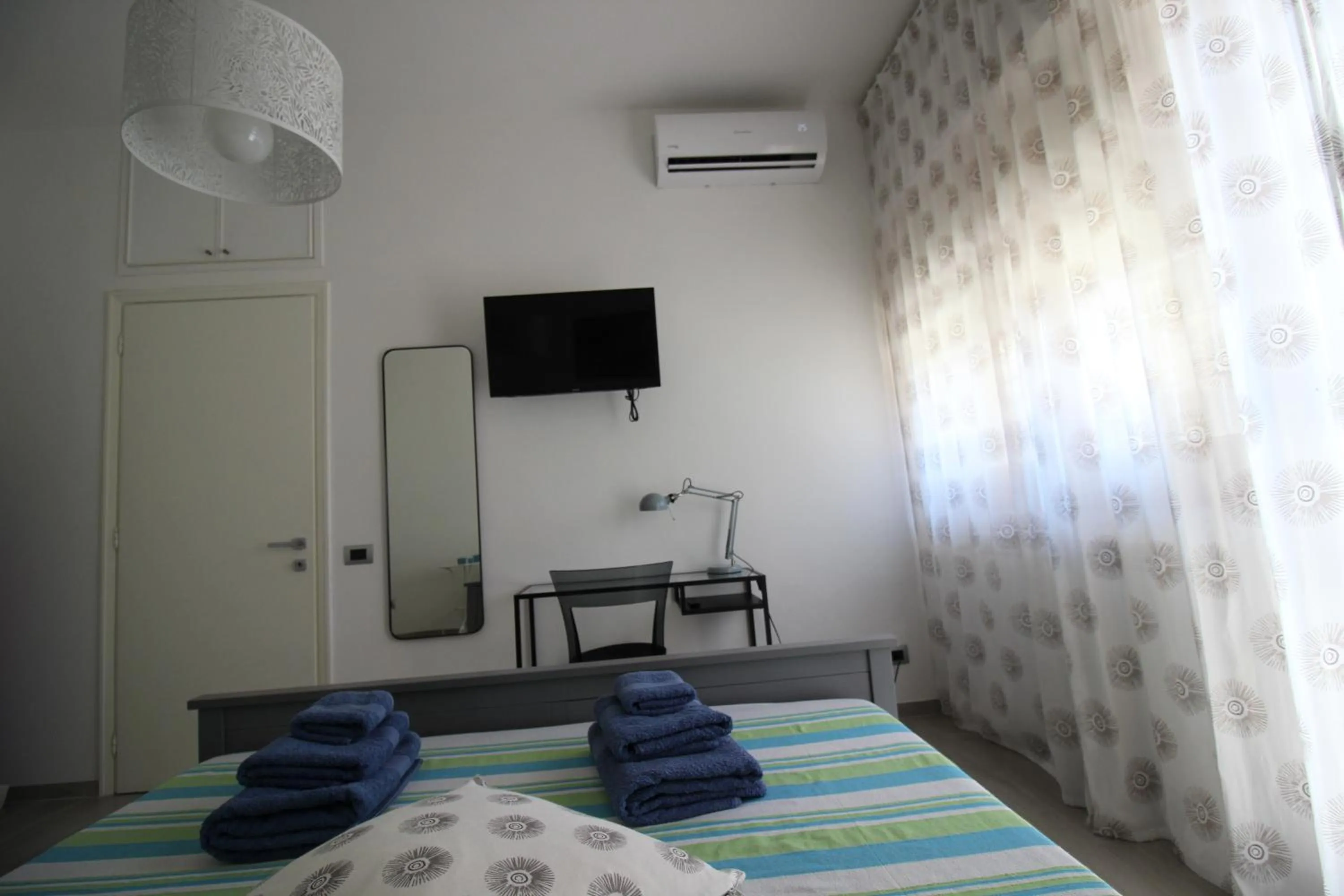 TV and multimedia, Bed in Appartamento Lungomare Toscanelli