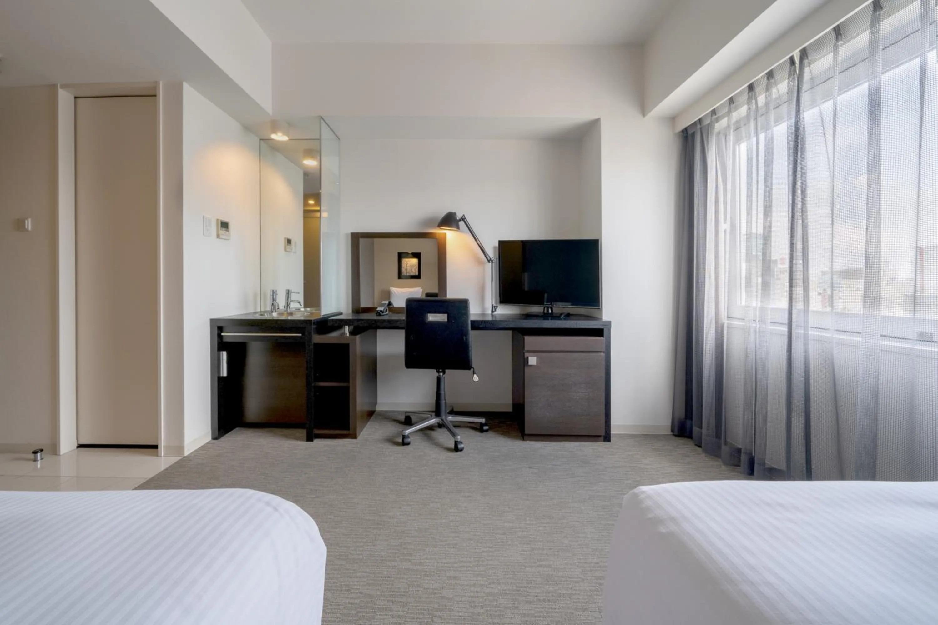 Photo of the whole room, Bed in Hotel Vista Sapporo Odori