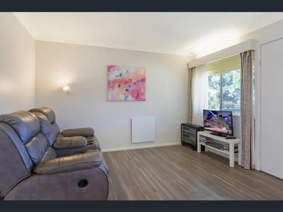 Living room in Top of the Lake Holiday Units Living room in Top of the Lake Holiday Units