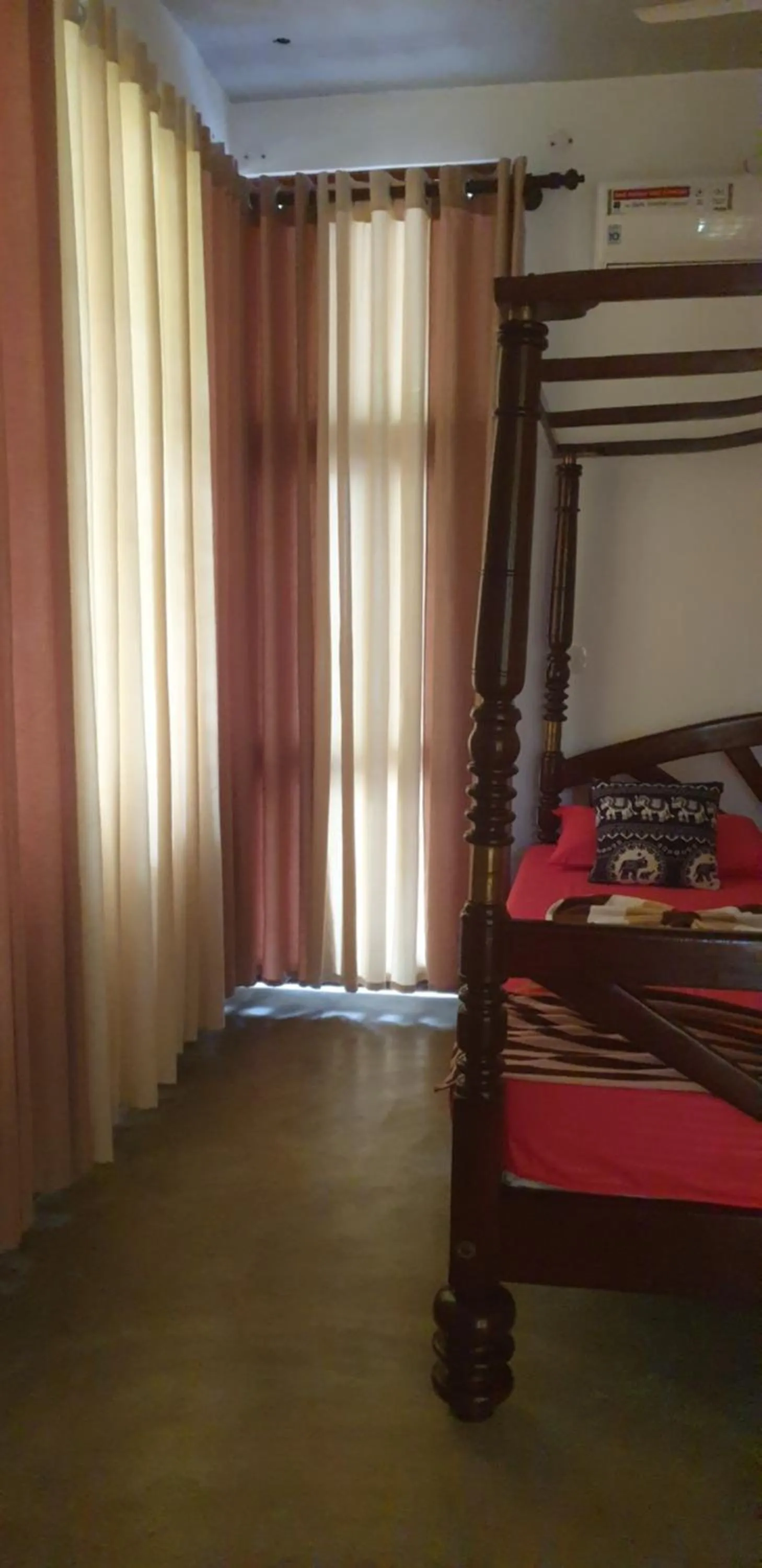Bed in Gems Garden Guest House