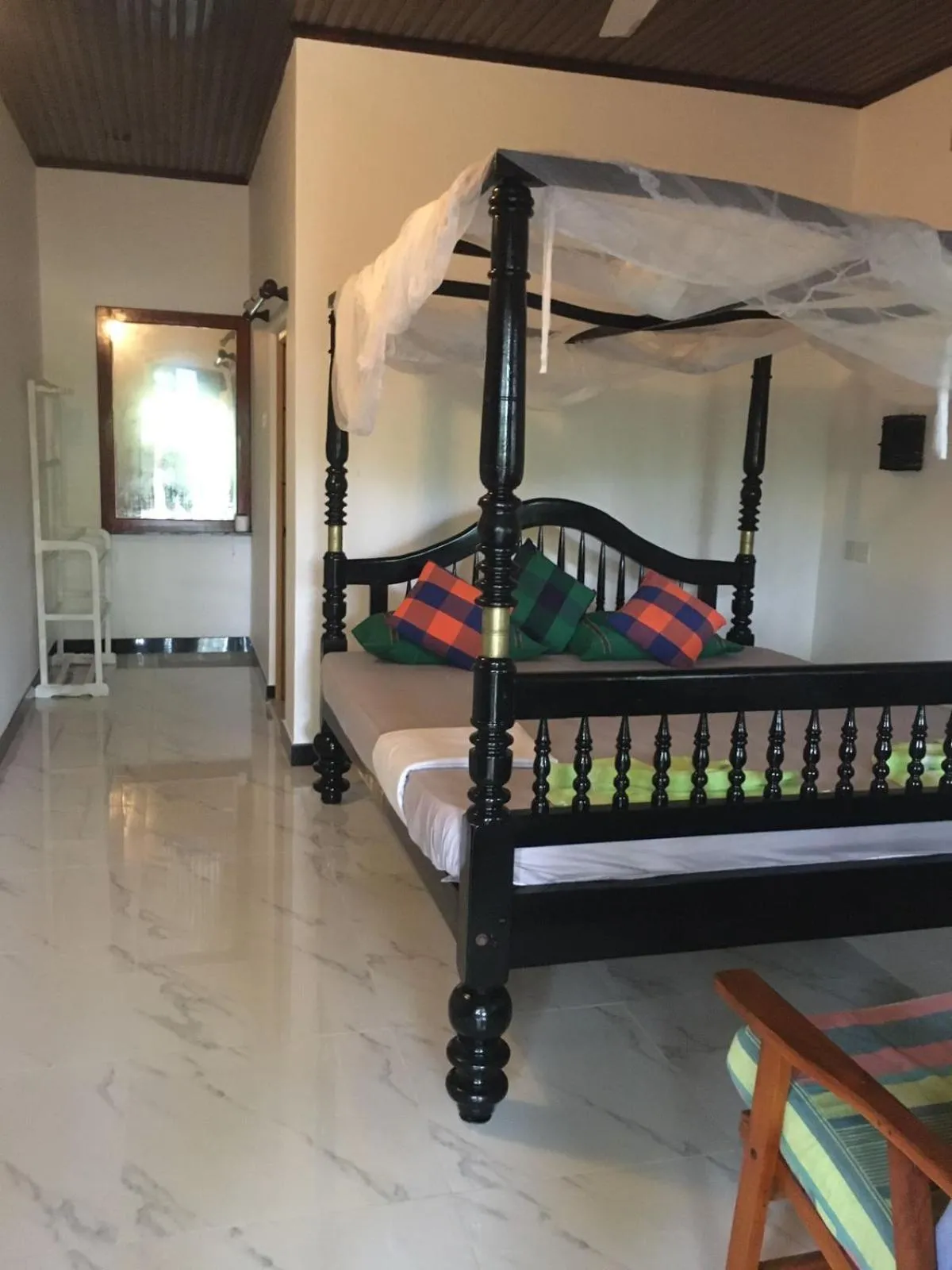 Bed in Gems Garden Guest House