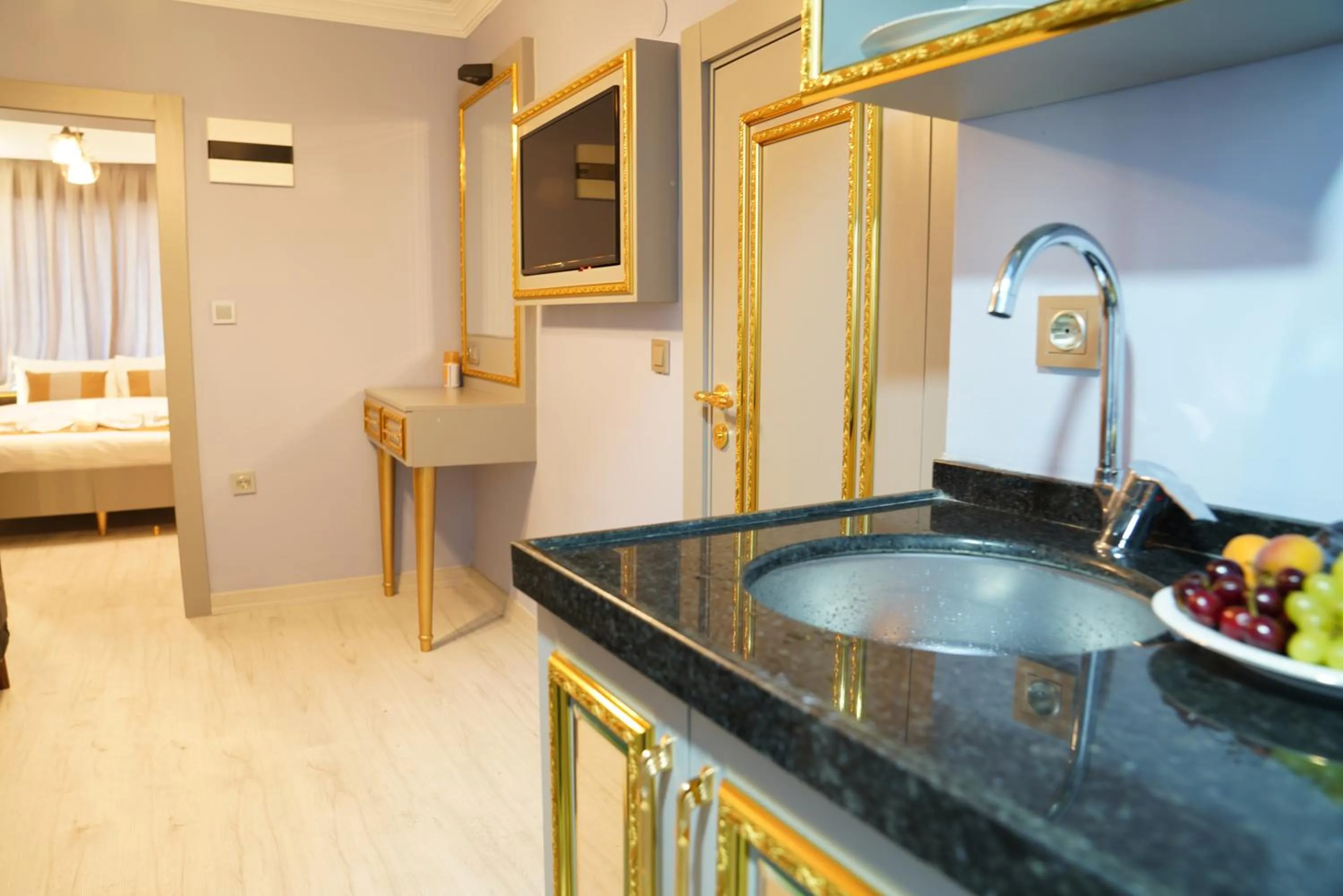 Kitchen or kitchenette in Taksim Maria suit hotel