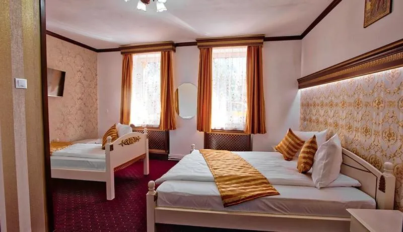 Bed in Pensiunea Sibiana