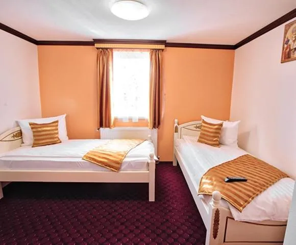 Bed in Pensiunea Sibiana