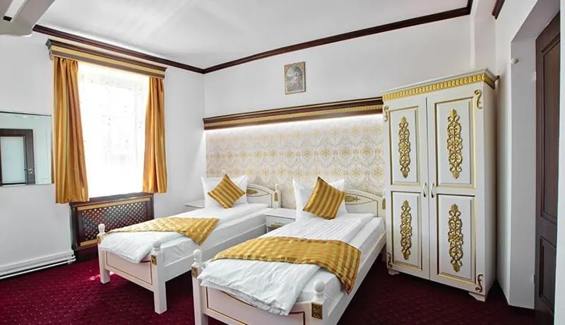 Bed in Pensiunea Sibiana