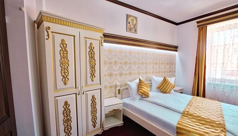 Bed in Pensiunea Sibiana