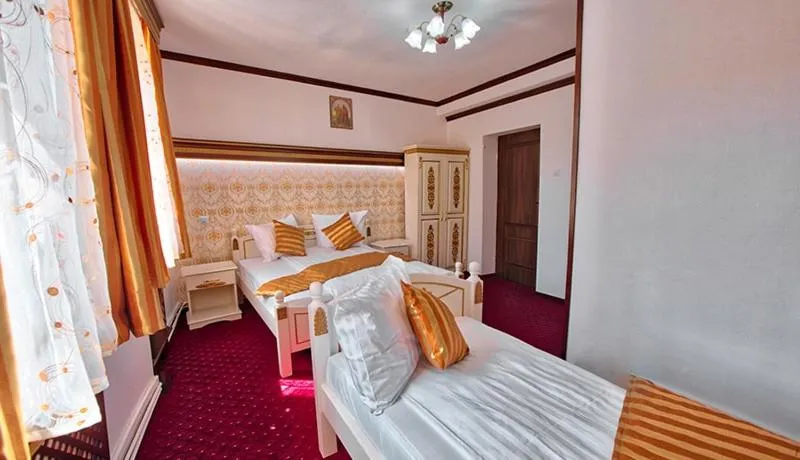 Bed in Pensiunea Sibiana