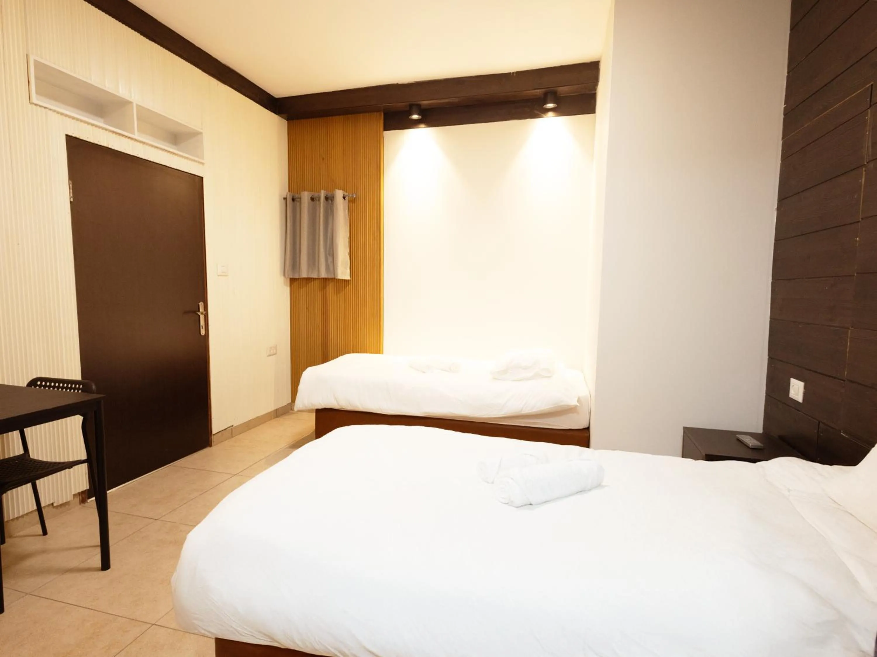 Bed in Mary's Well Apartments