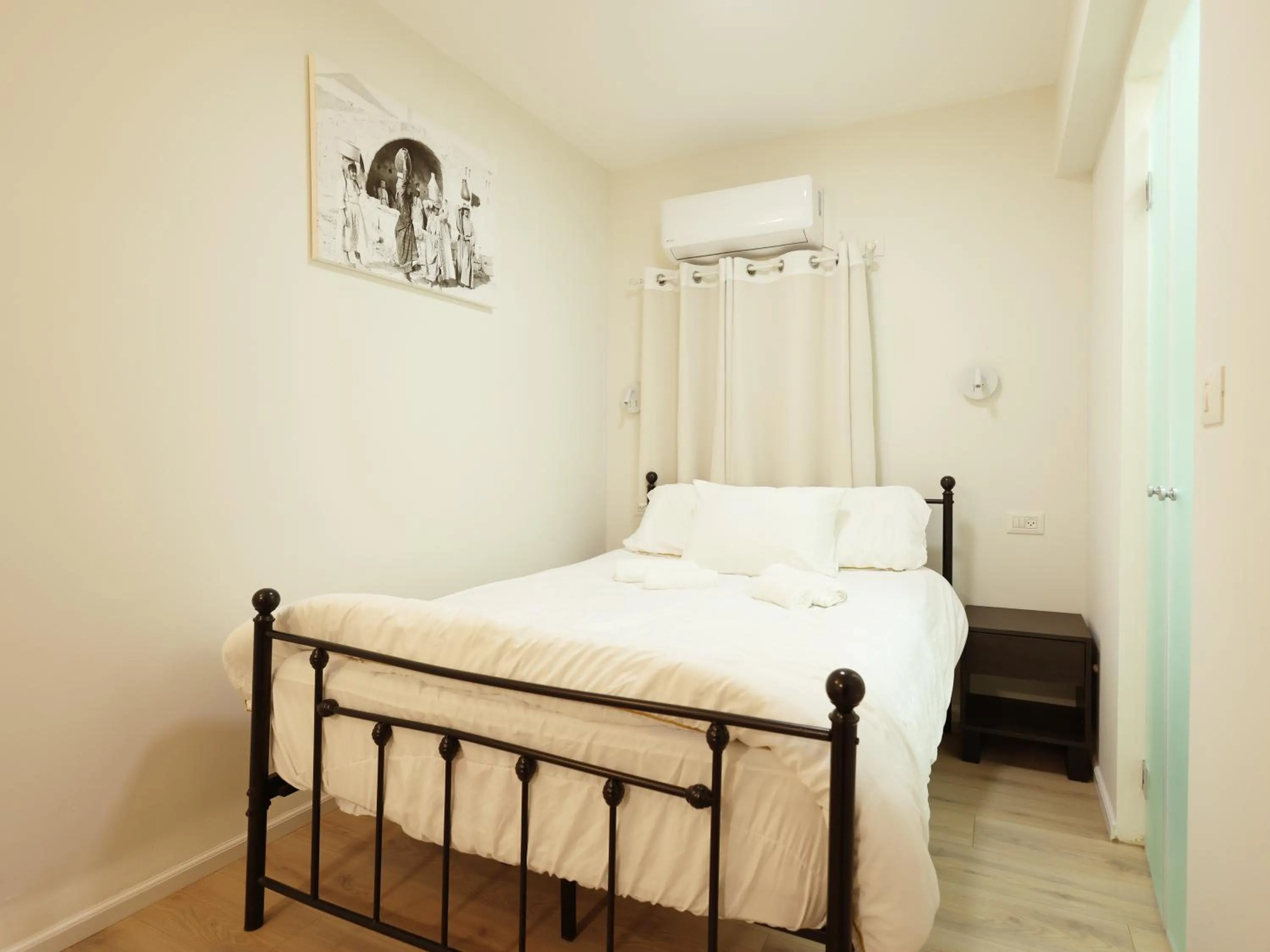 Bed in Mary's Well Apartments