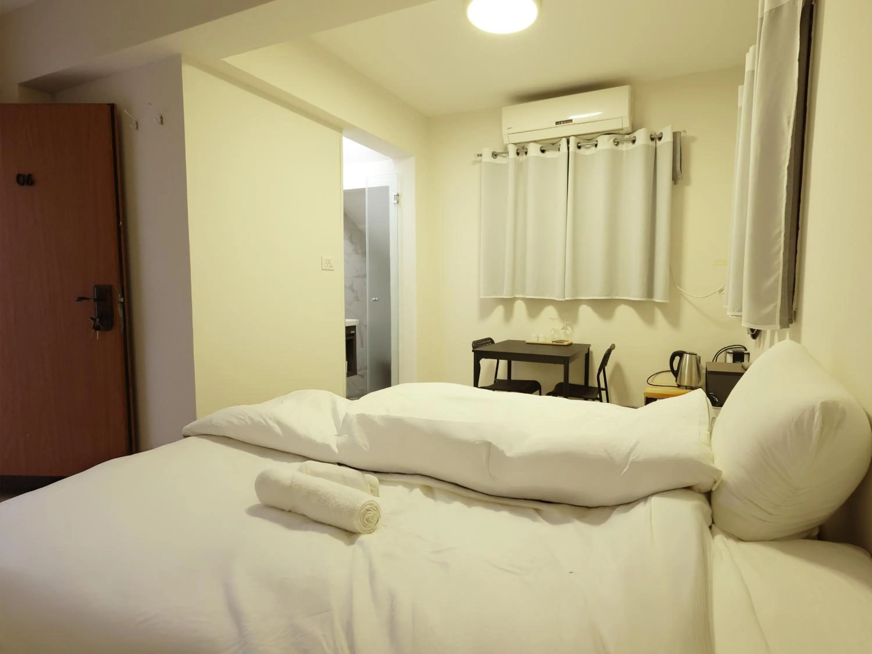 Bed in Mary's Well Apartments