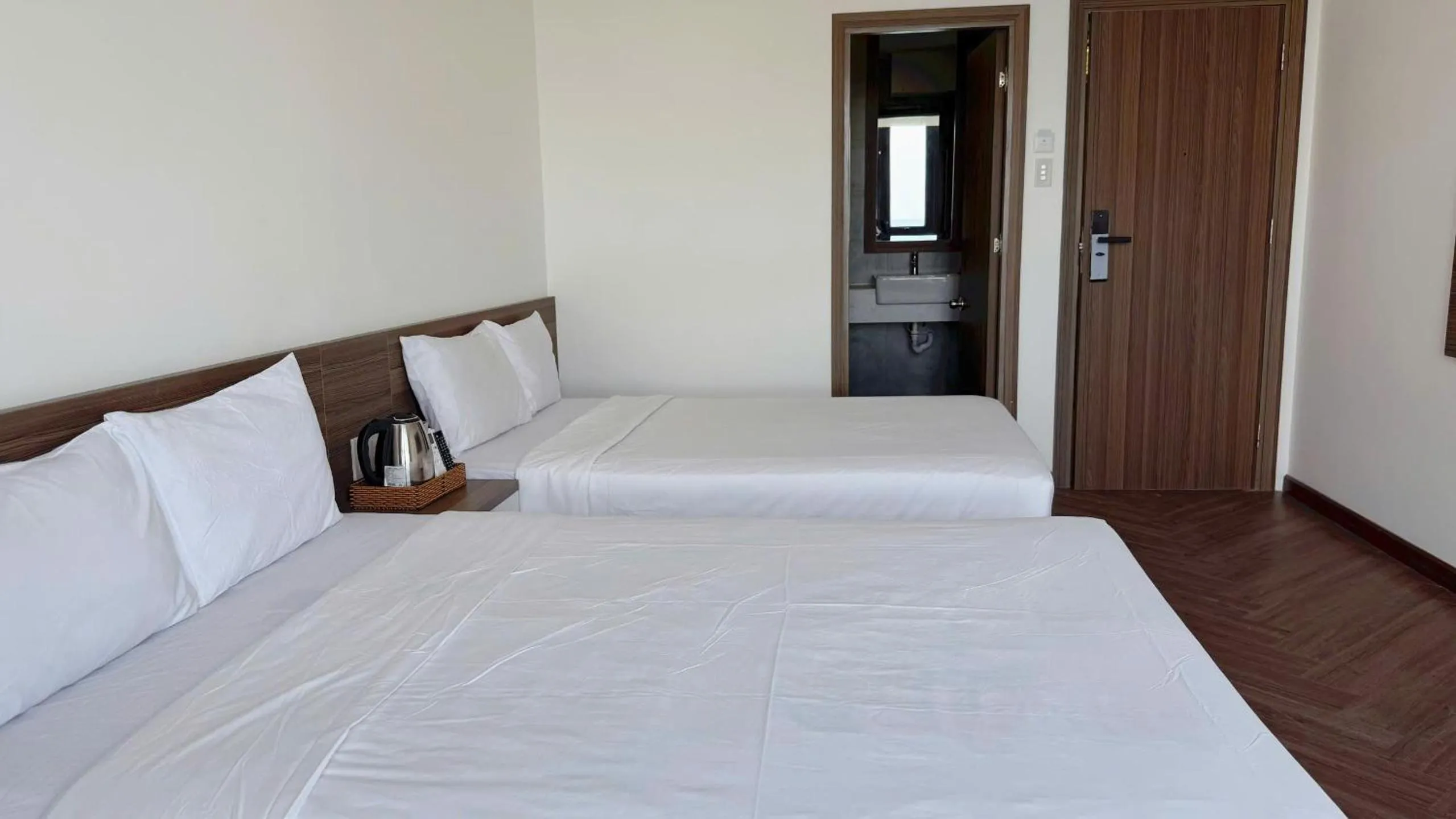 Bed in AQua Hotel & Spa