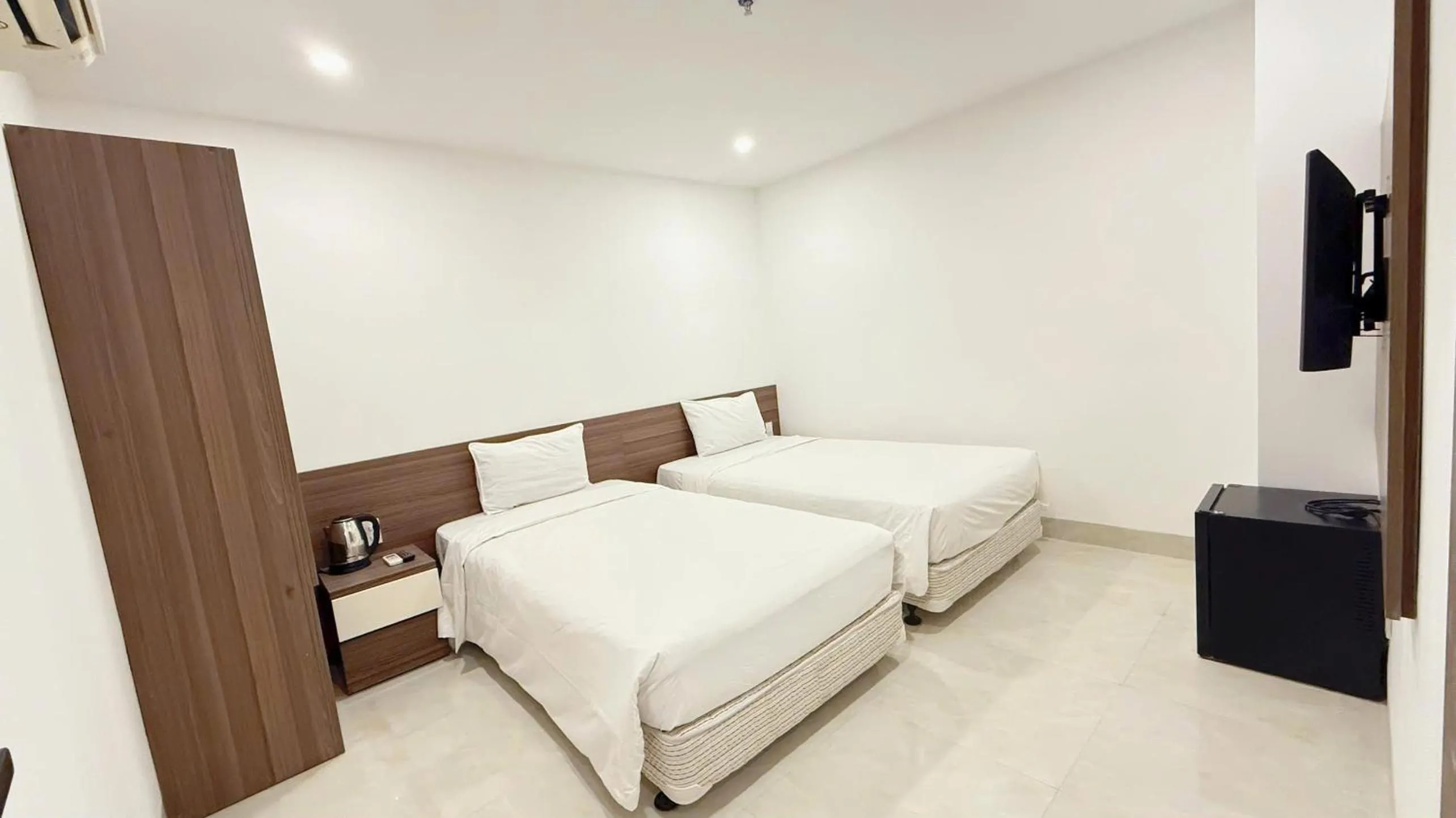 Bed in AQua Hotel & Spa