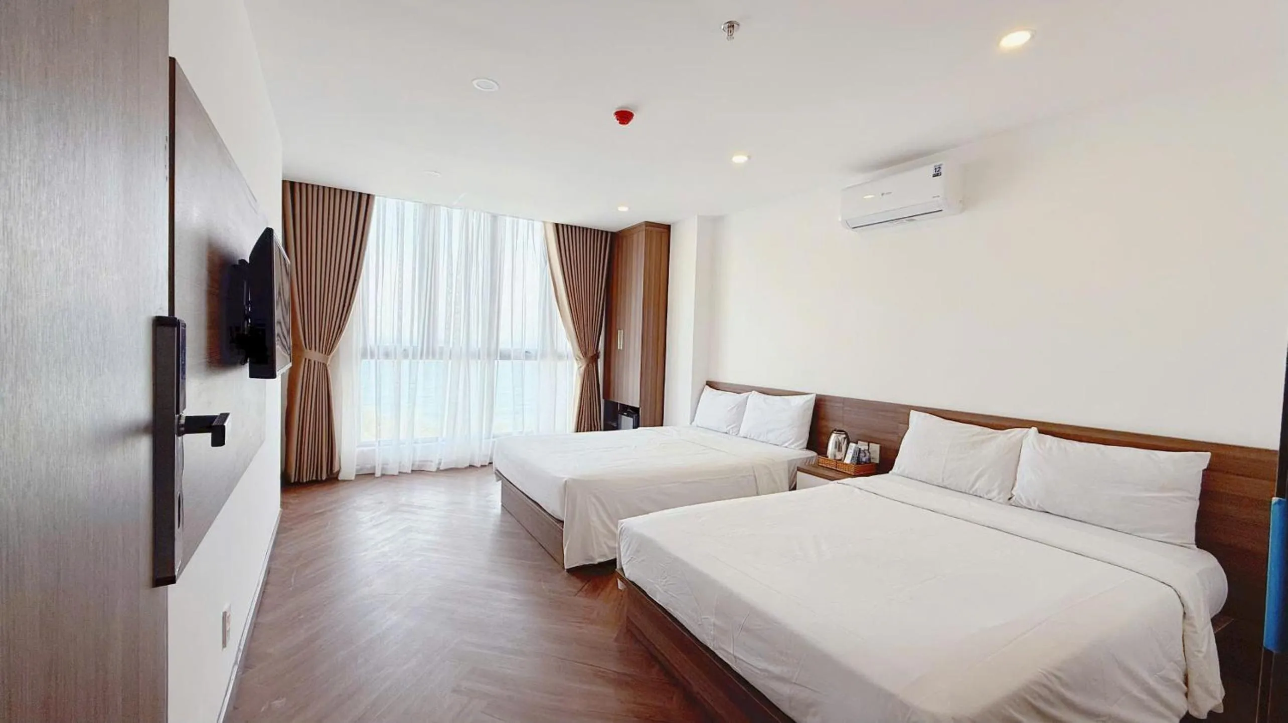 Bed in AQua Hotel & Spa