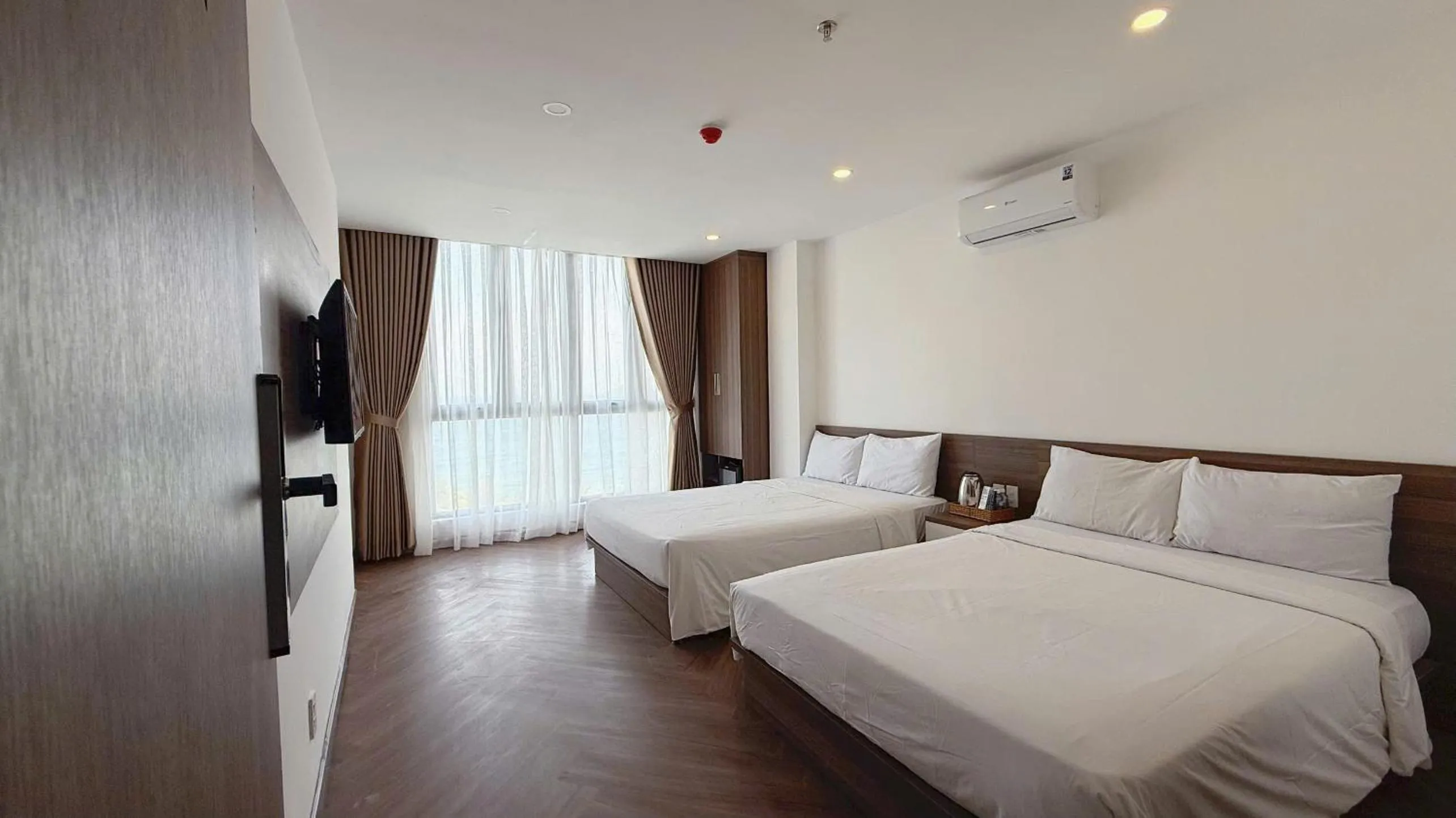 Bed in AQua Hotel & Spa