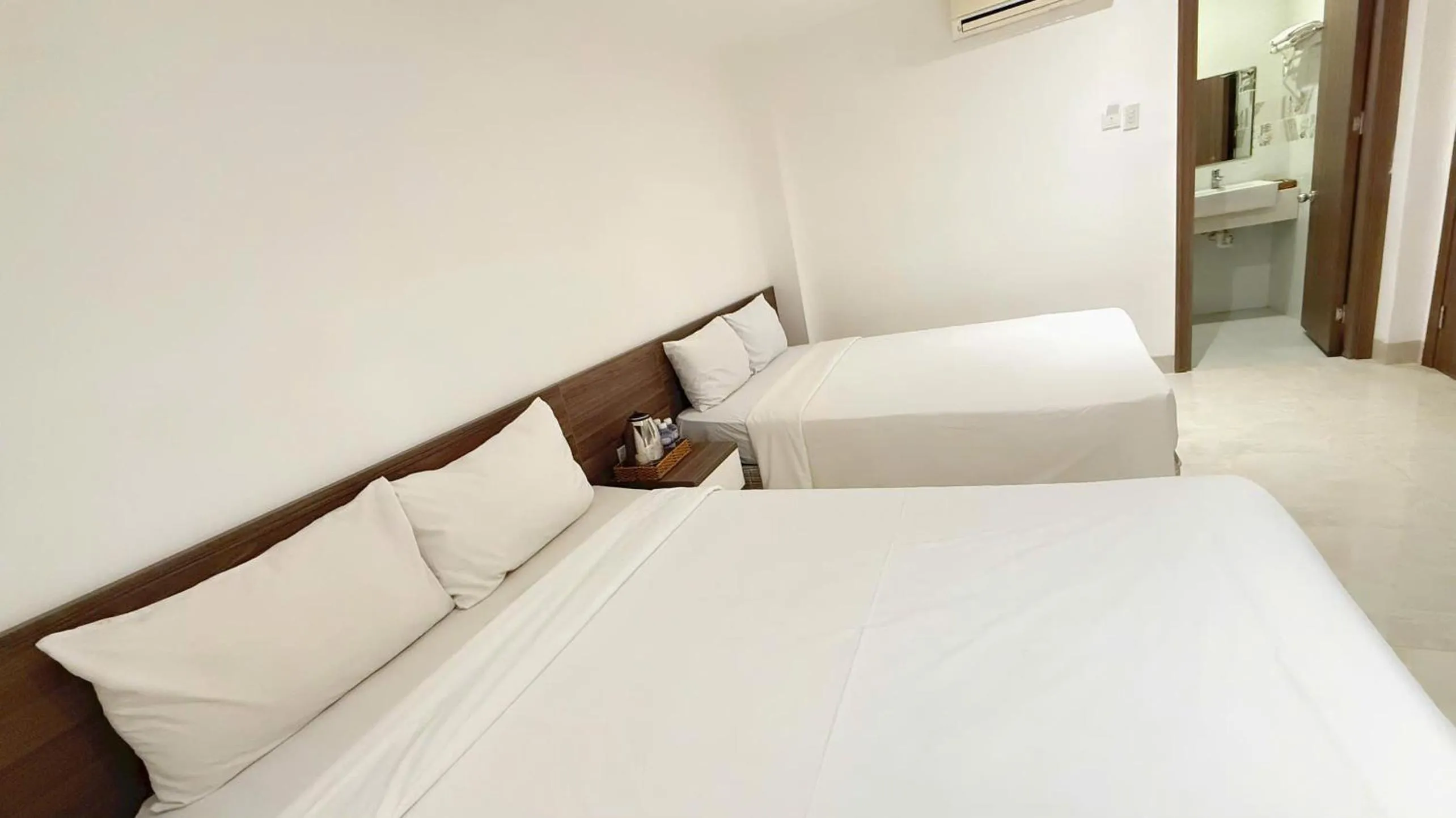 Bed in AQua Hotel & Spa