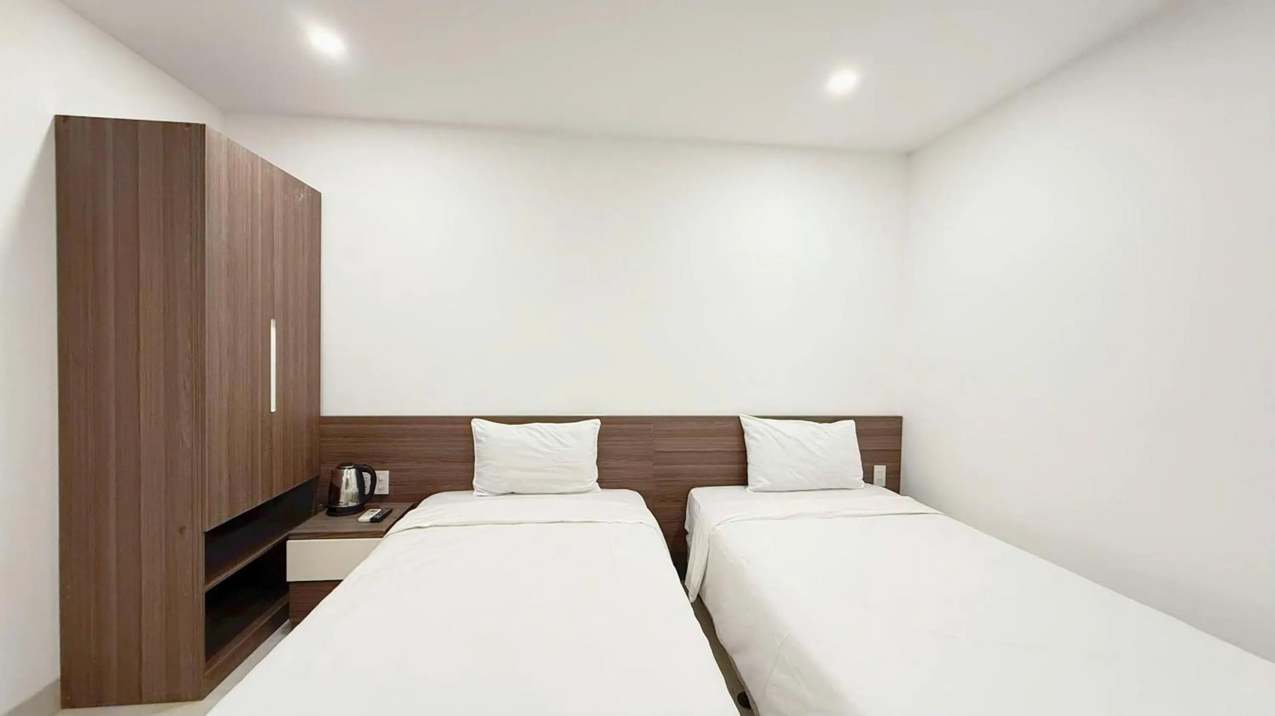 Bed in AQua Hotel & Spa