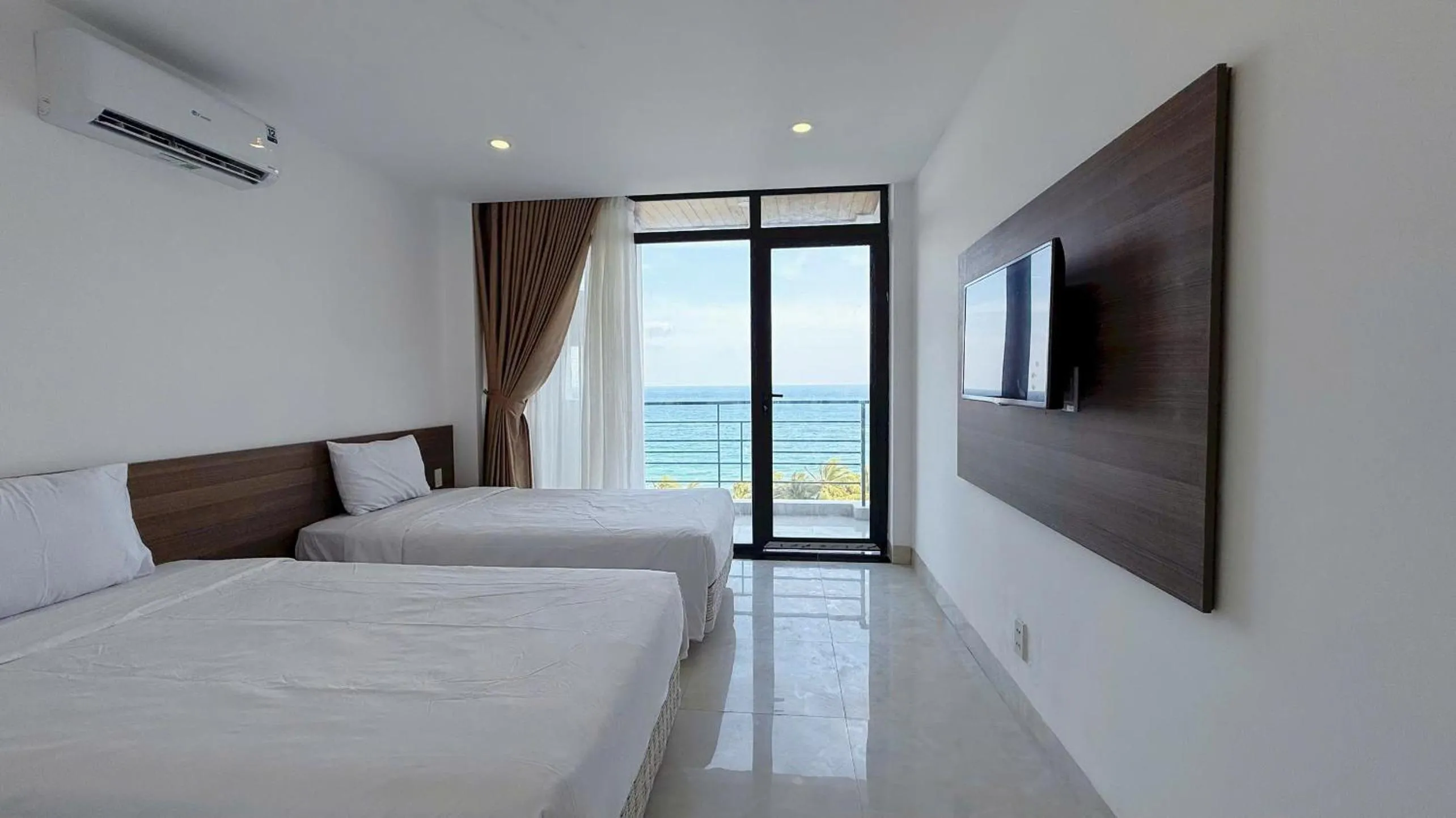 Bed in AQua Hotel & Spa