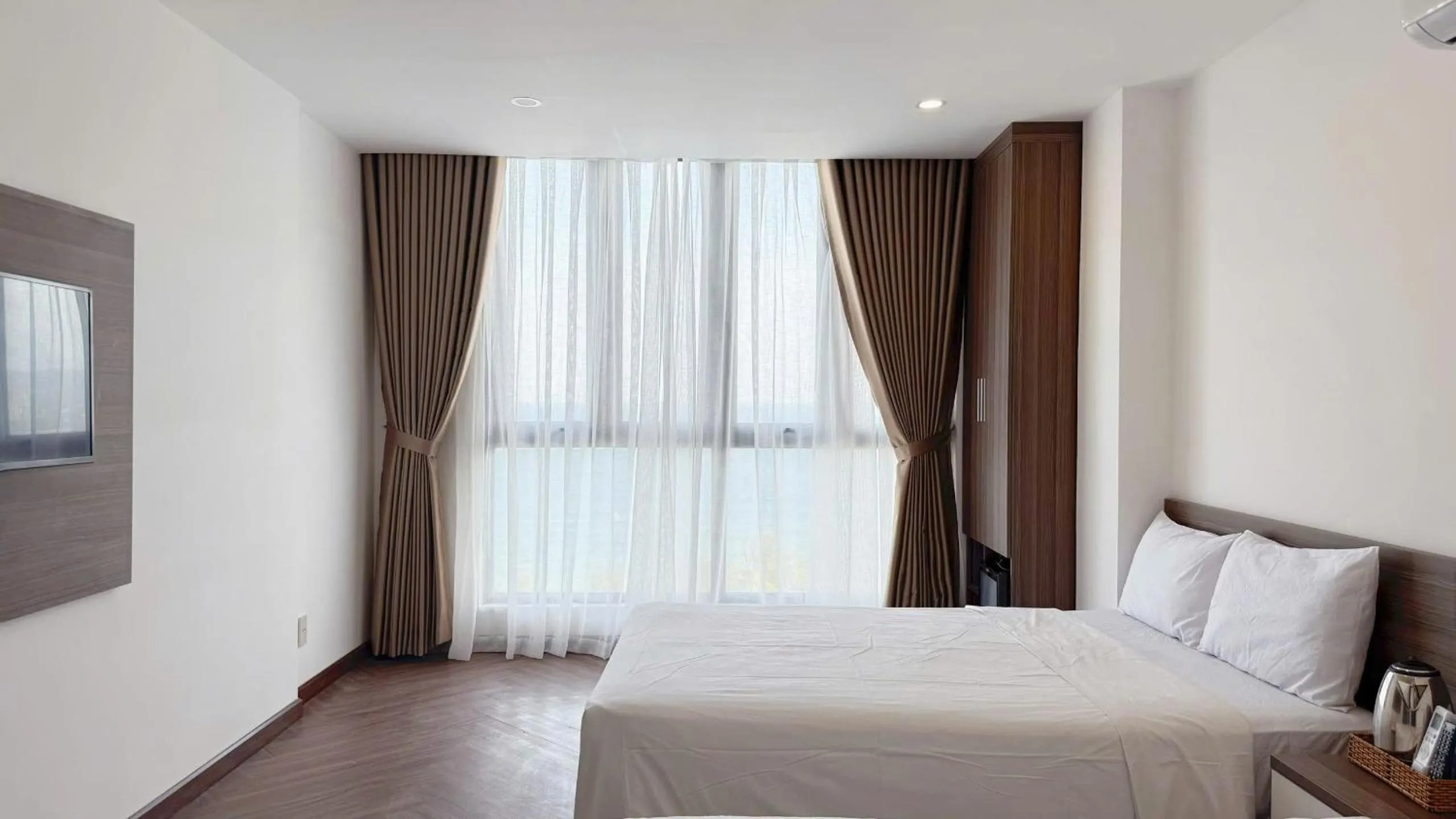 Bed in AQua Hotel & Spa