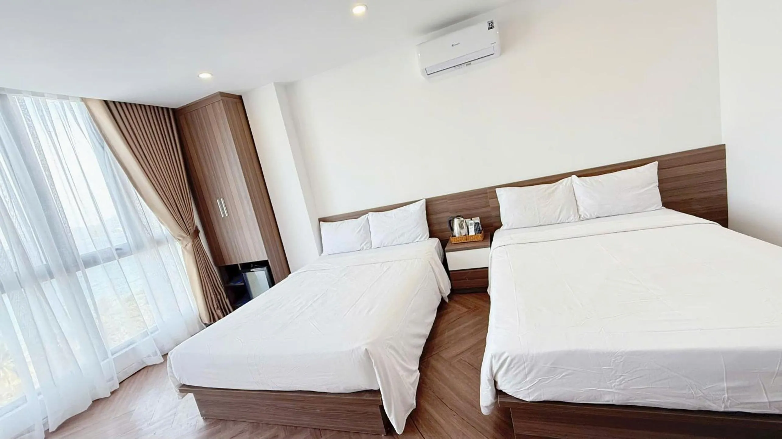 Bed in AQua Hotel & Spa