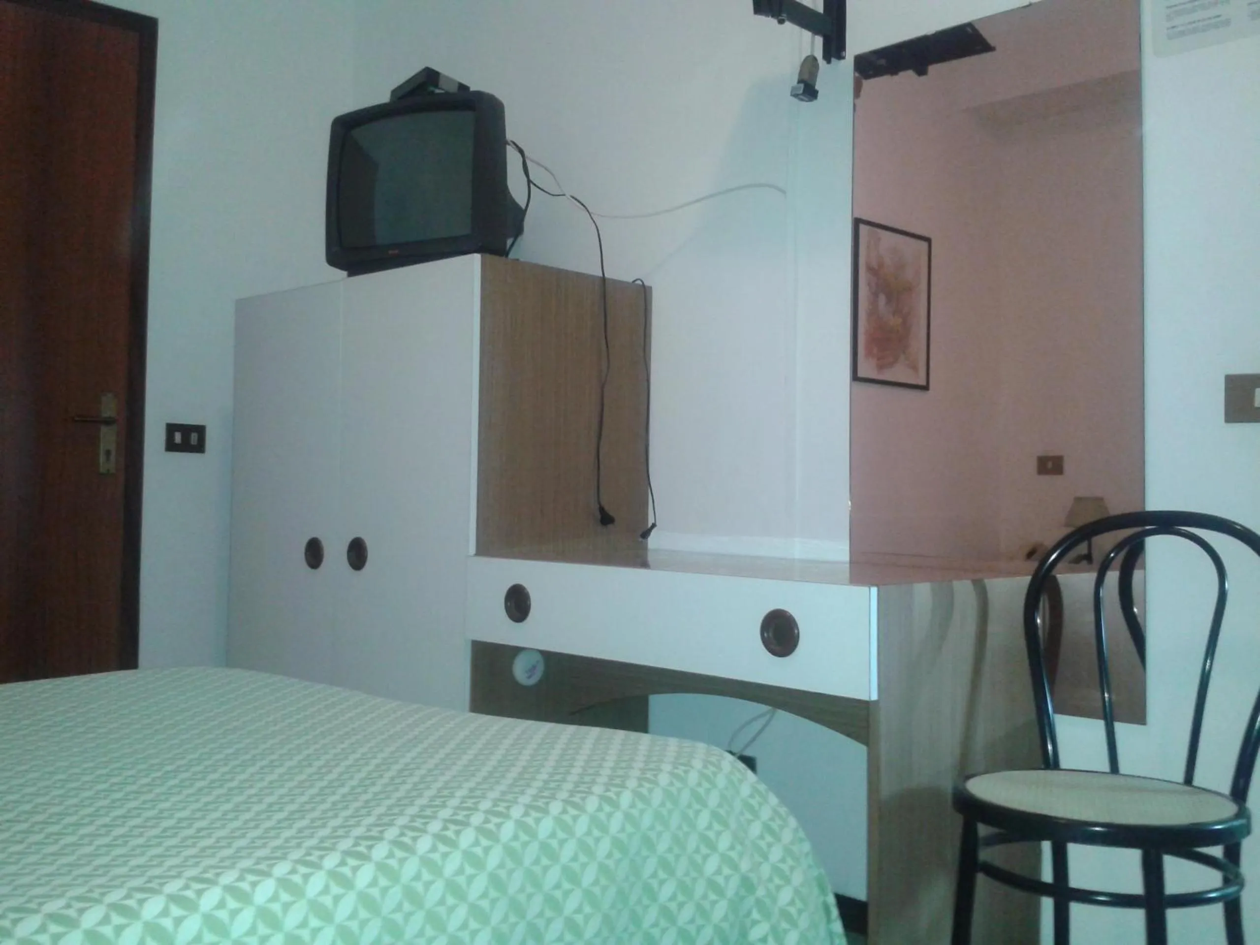 Decorative detail, Bed in Albergo Tenda Verde