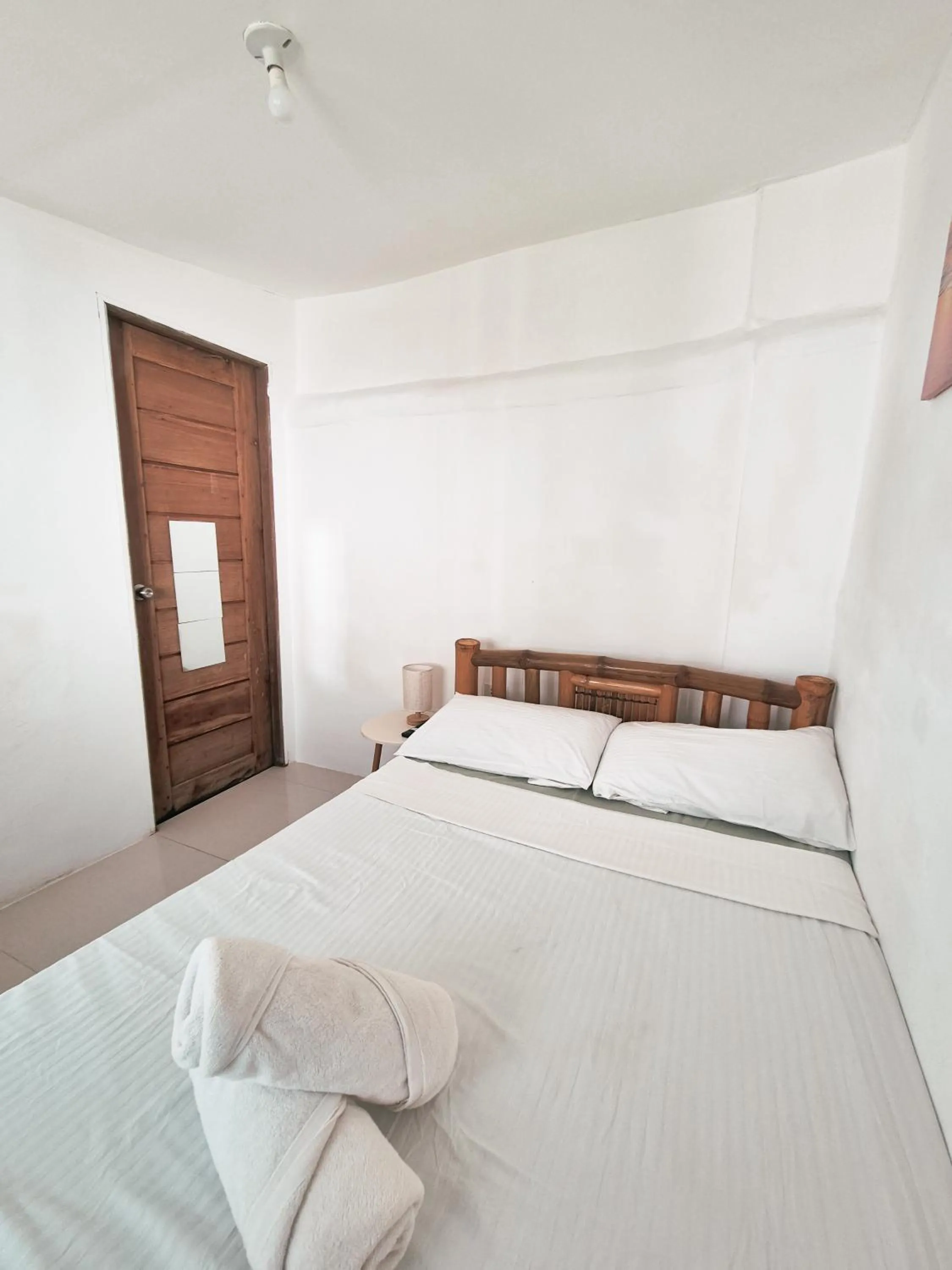 Bed in 148 Guesthouse and Resort