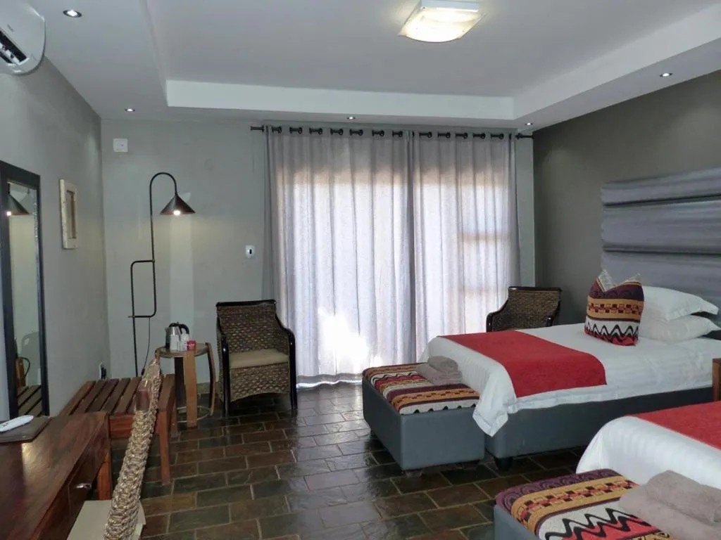 Photo of the whole room, Bed in Opuwo Country Lodge
