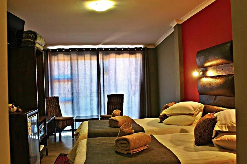 Photo of the whole room, Bed in Opuwo Country Lodge