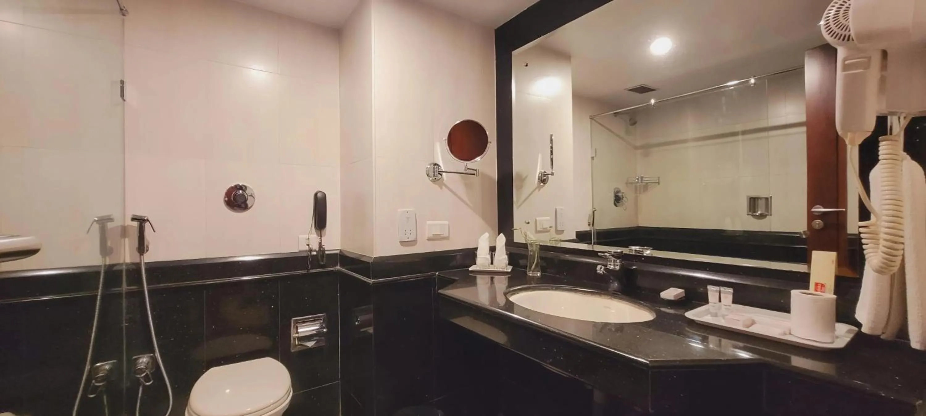 Bathroom in ASHOKA INN