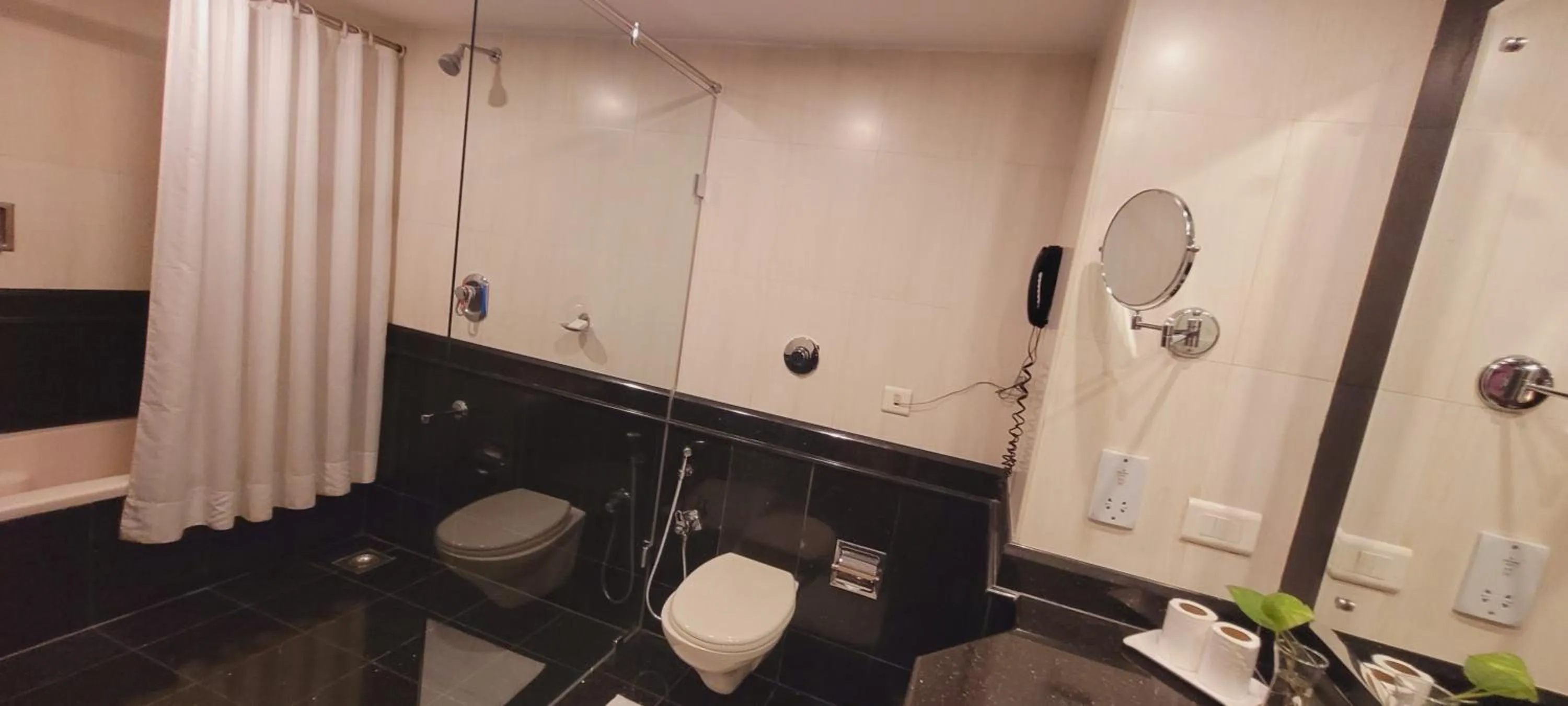 Bathroom in ASHOKA INN