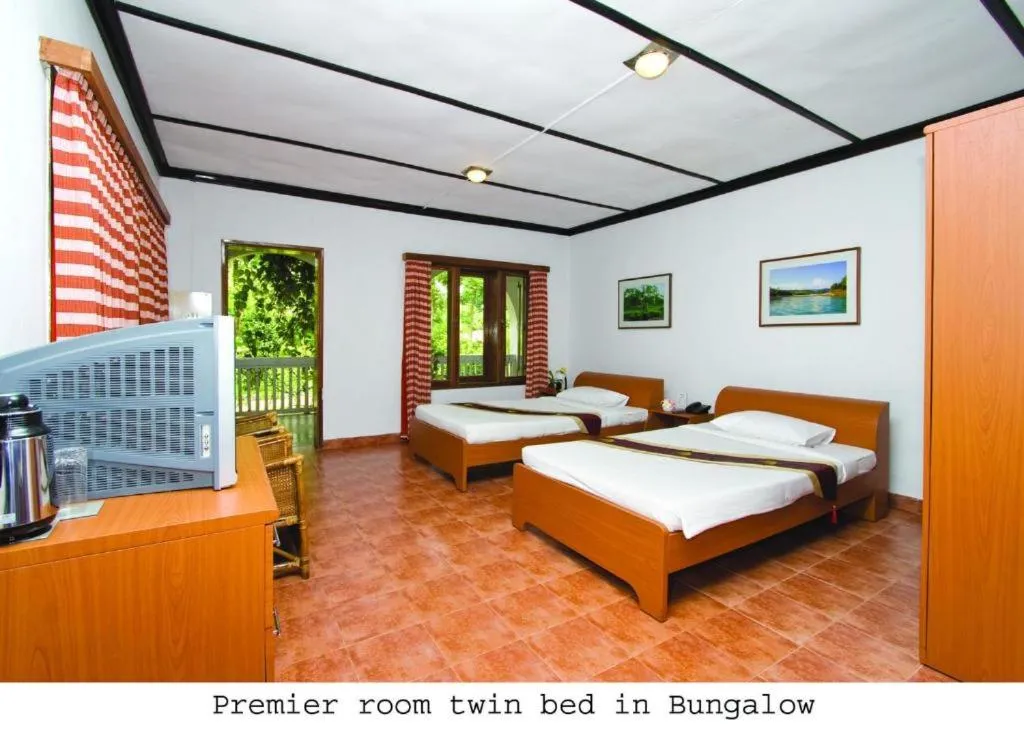 Bed in Nazimgarh Garden Resort