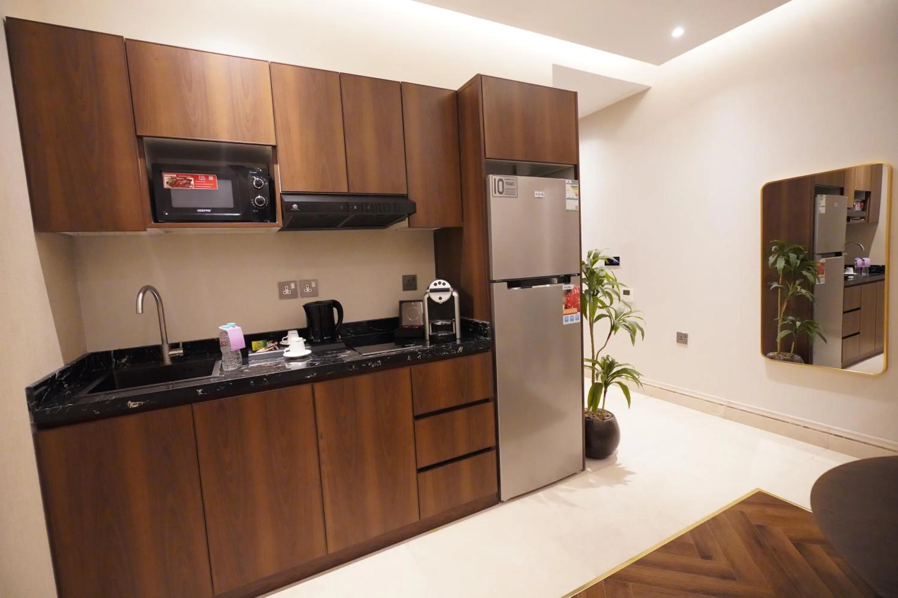 Kitchen or kitchenette in Tura Hotel Olaya - فندق ترى العليا