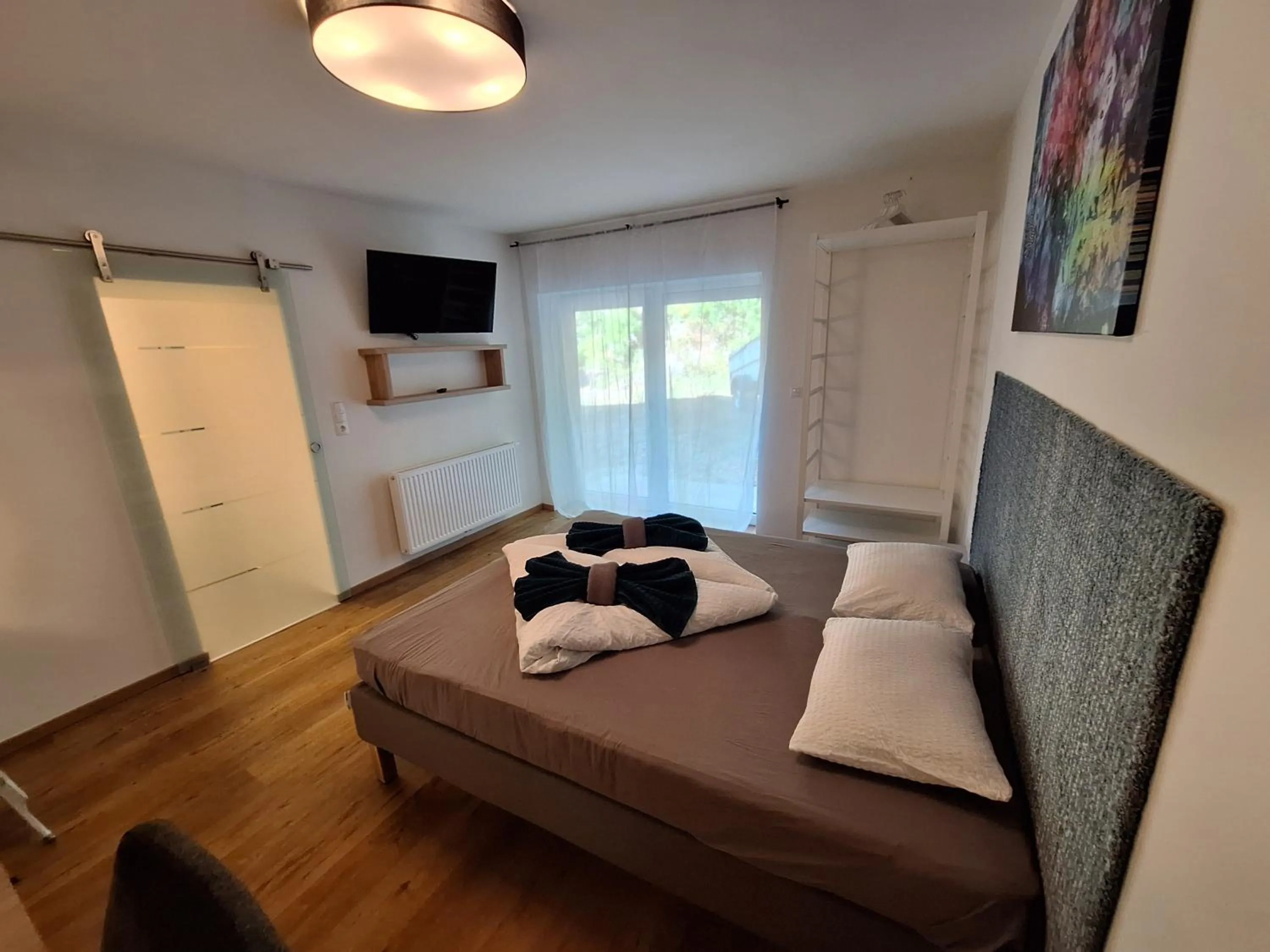 Bed in Flataid Gästehaus Graschi - Steinbergstraße