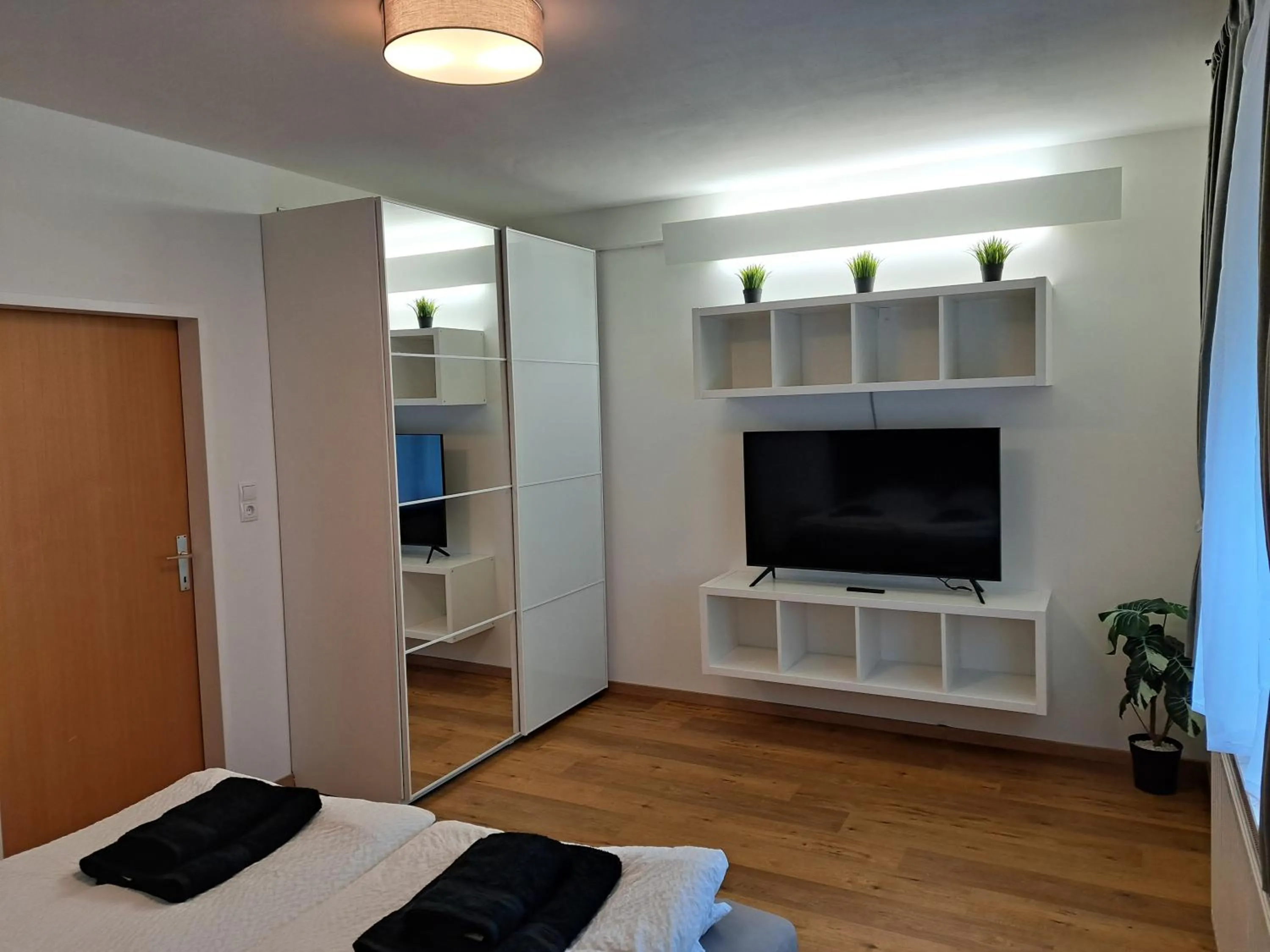 Bed in Flataid Gästehaus Graschi - Steinbergstraße
