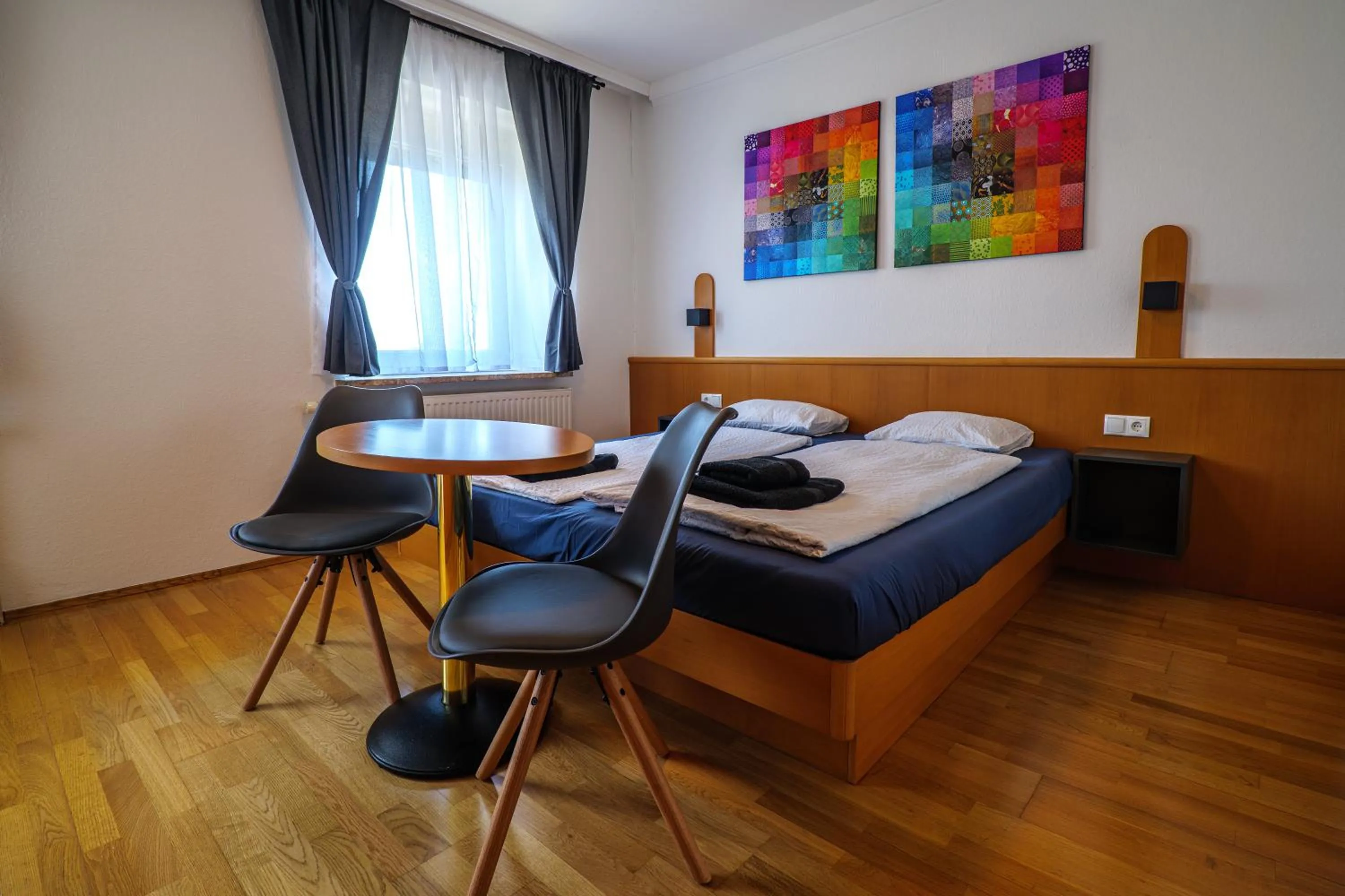 Bed in Flataid Gästehaus Graschi - Steinbergstraße