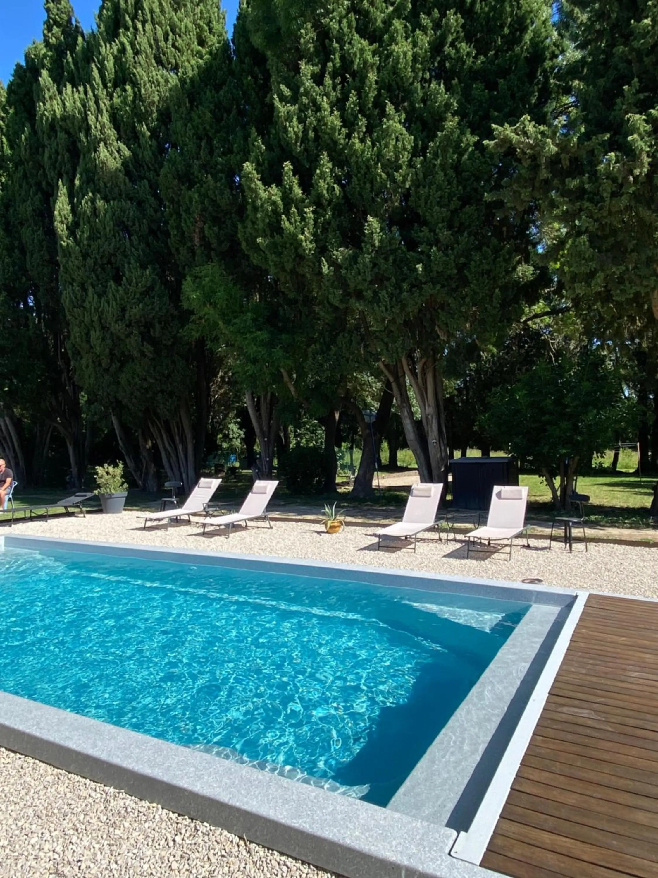 Swimming pool in Appartement Les Cyprès de l’Île